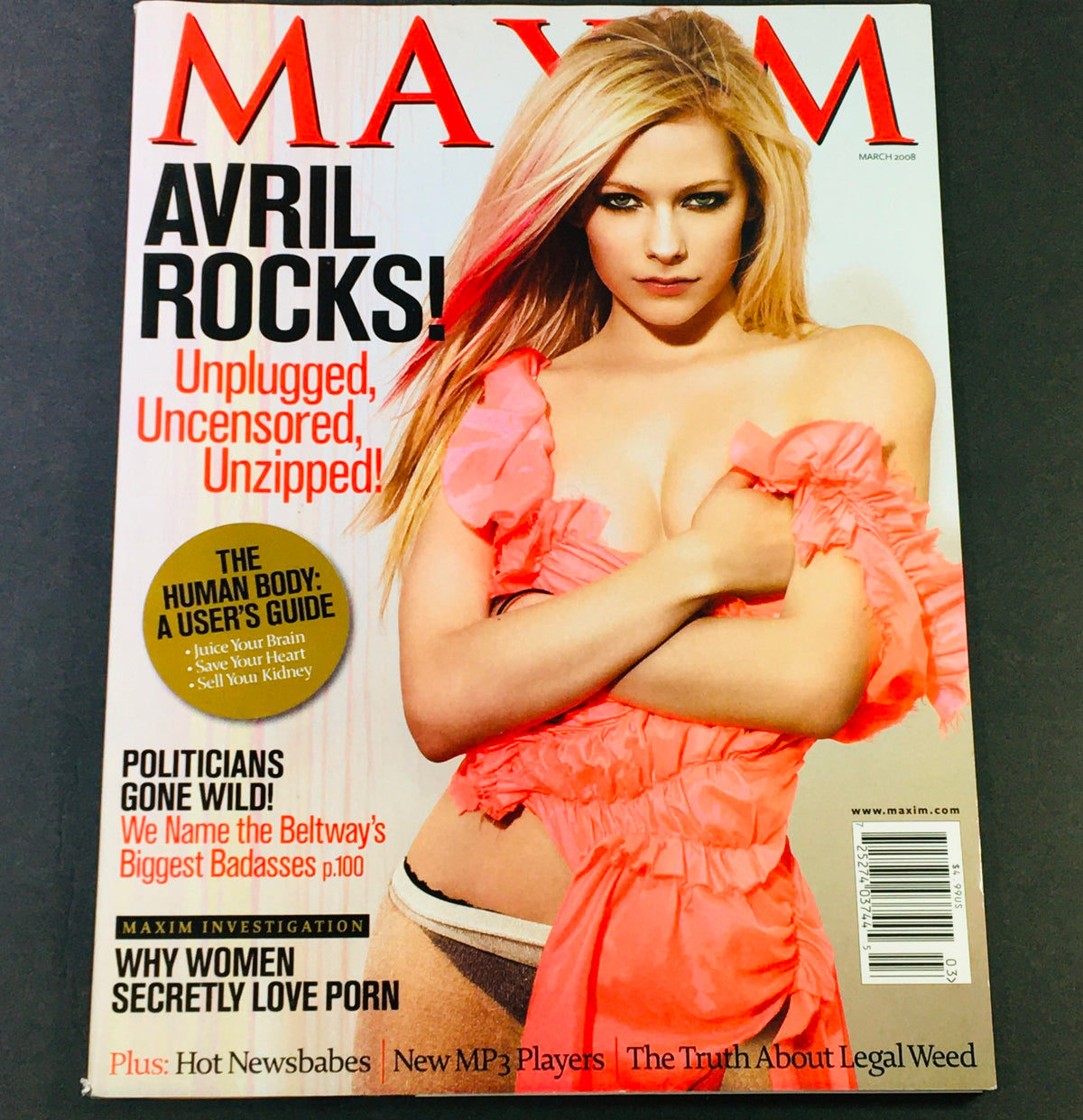 Maxim Magazine March 2008 cover featuring Avril Lavigne with the text 'Avril Rocks! Unplugged, Uncensored, Unzipped' highlighting her iconic presence in pop culture.