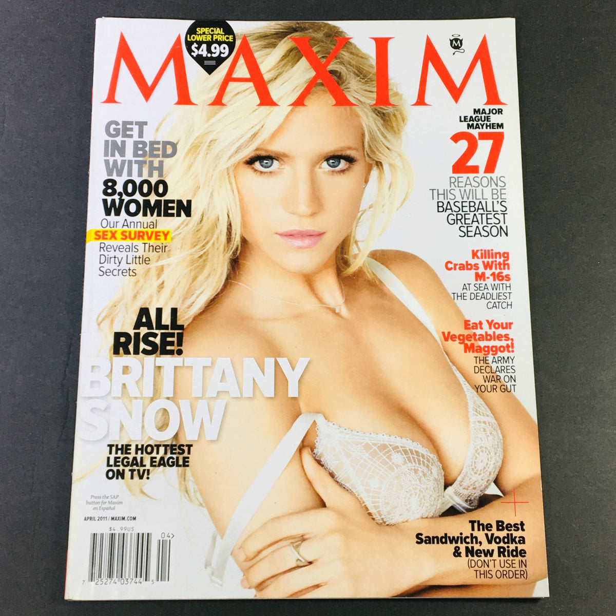Maxim Magazine April 2011 featuring Brittany Snow, the hottest legal eagle on TV, on the cover. This collectible vintage issue showcases Brittany Snow in a captivating pose, highlighting her charm and charisma.