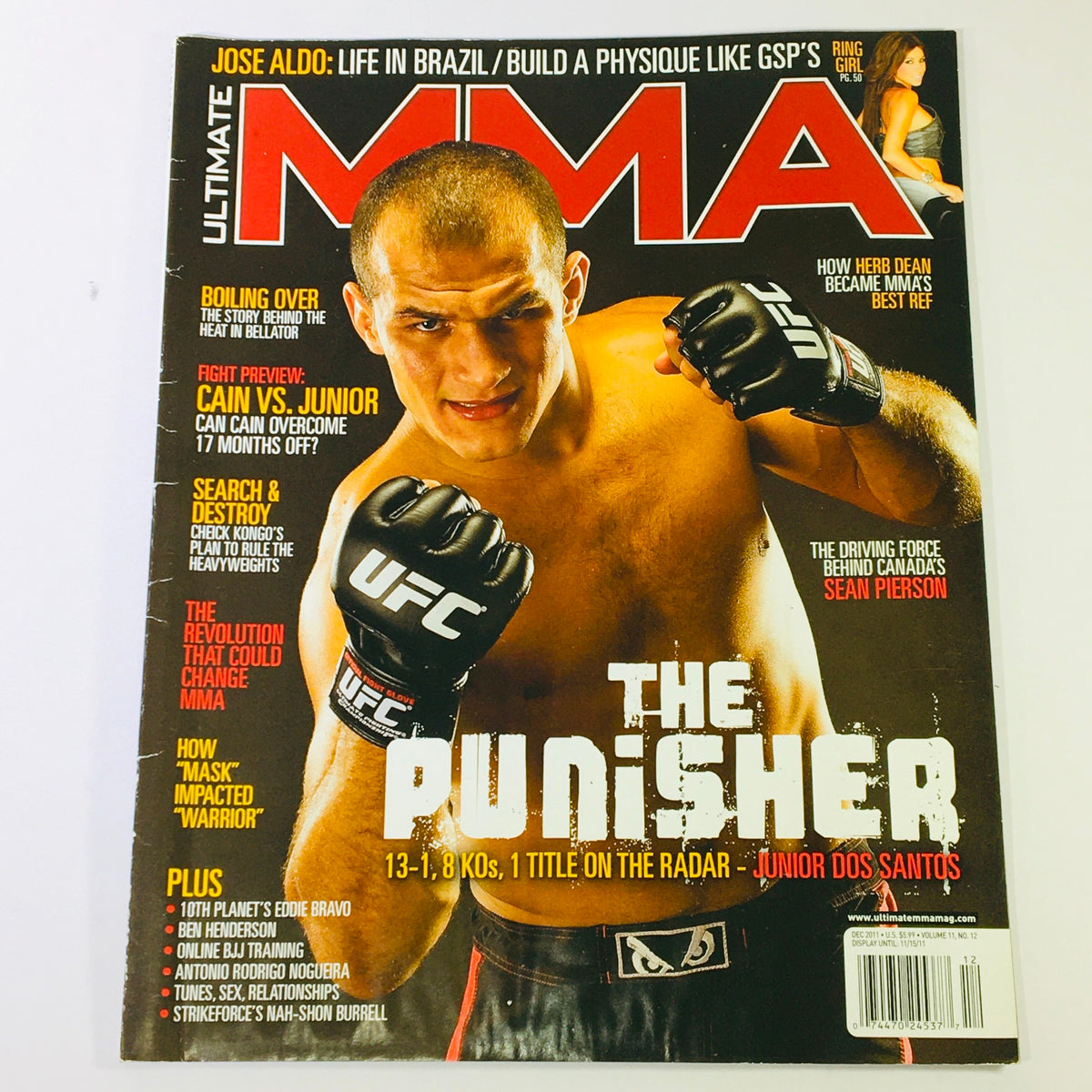Ultimate MMA Magazine cover from December 2011 featuring Sean Pierson and a promotional image of Junior dos Santos as 'The Punisher' showcasing his fight career.