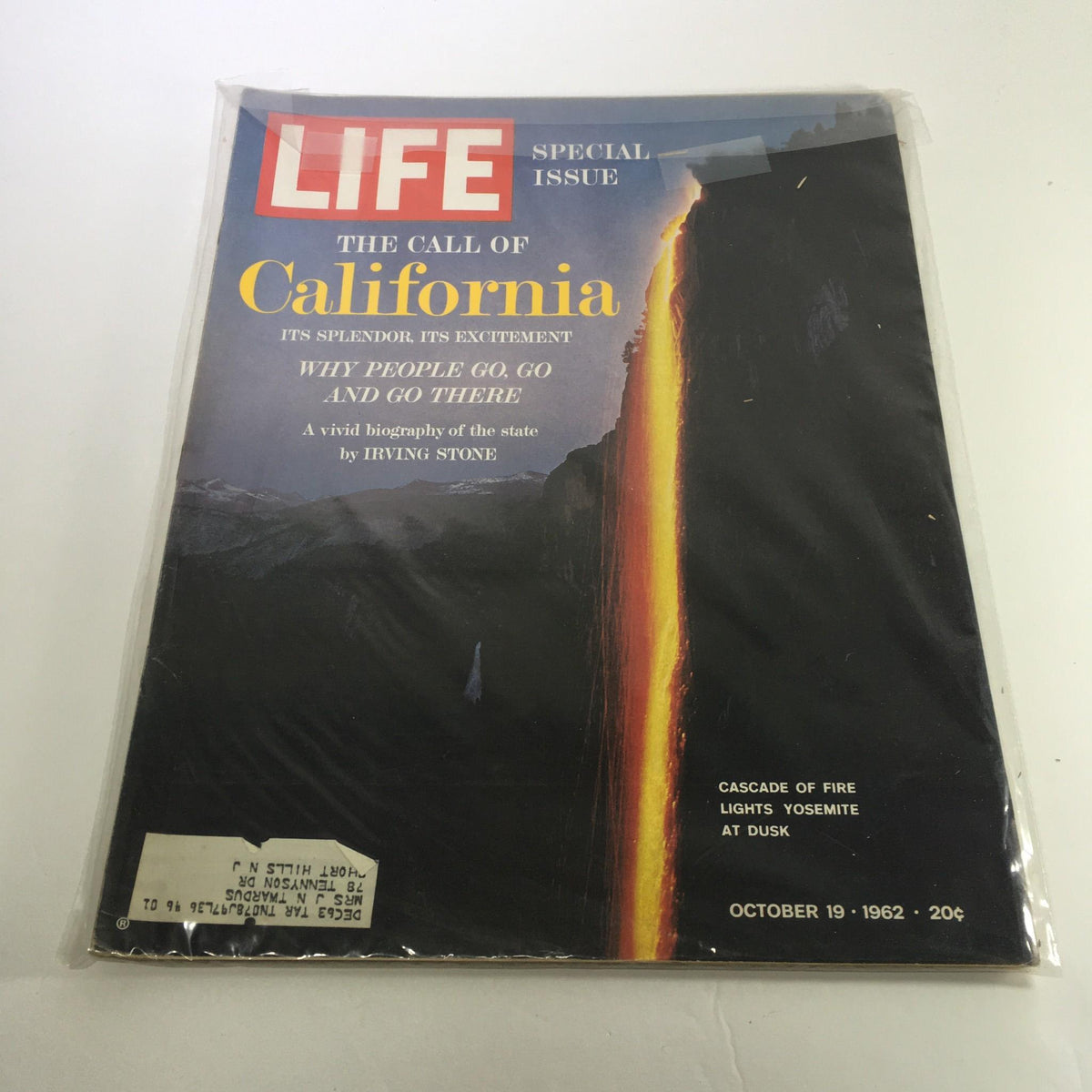 Life Magazine from October 19, 1962, featuring the cover titled 'Cascade Of Fire Lights Yosemite At Dusk', showcasing vibrant imagery of Yosemite National Park at dusk, a special issue that captures the essence of California's natural beauty.