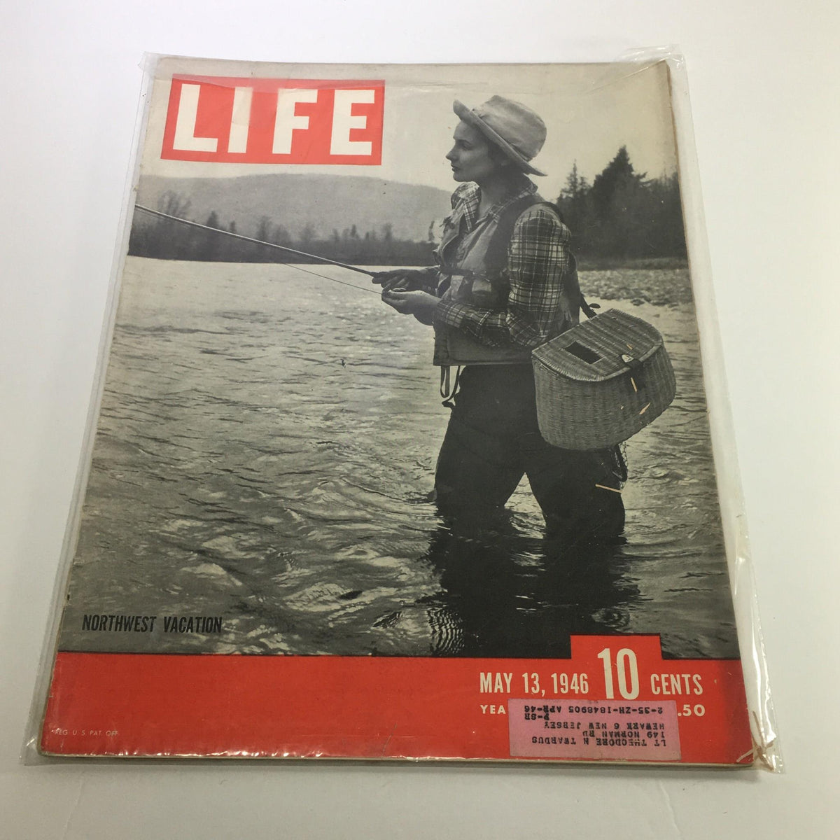 Life Magazine cover from May 13, 1946 featuring a woman fishing in the river, with the title 'Northwest Vacation' highlighting the essence of post-war travel.