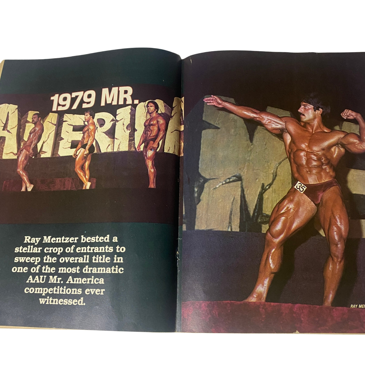 Dramatic photo of Ray Mentzer posing during the 1979 AAU Mr. America competition featured in Bodybuilder Magazine March 1980 Vol 2 No 3.