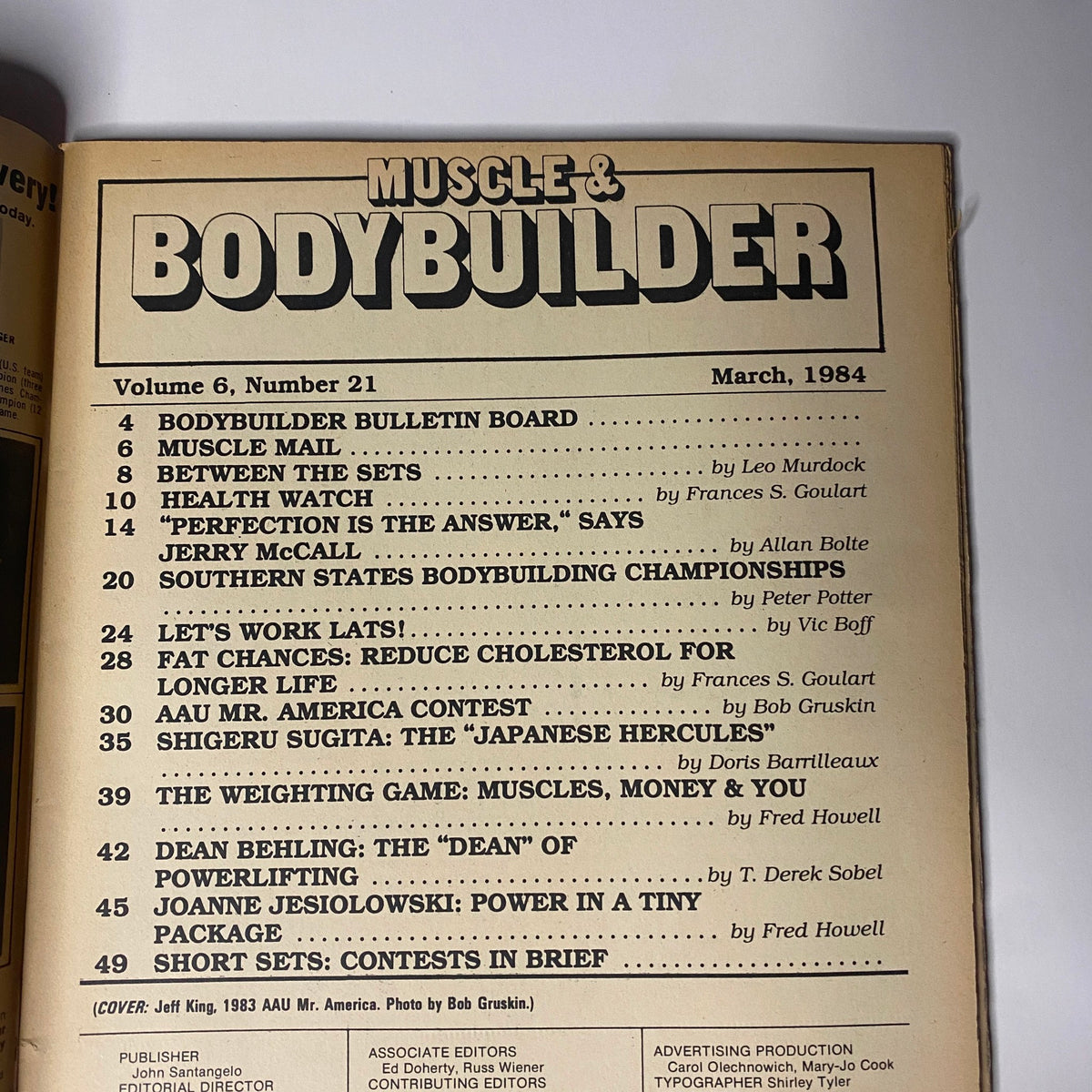Table of Contents from Muscle & Bodybuilder Magazine March 1984, Volume 6, No. 21, listing articles on bodybuilding competitions and health features.