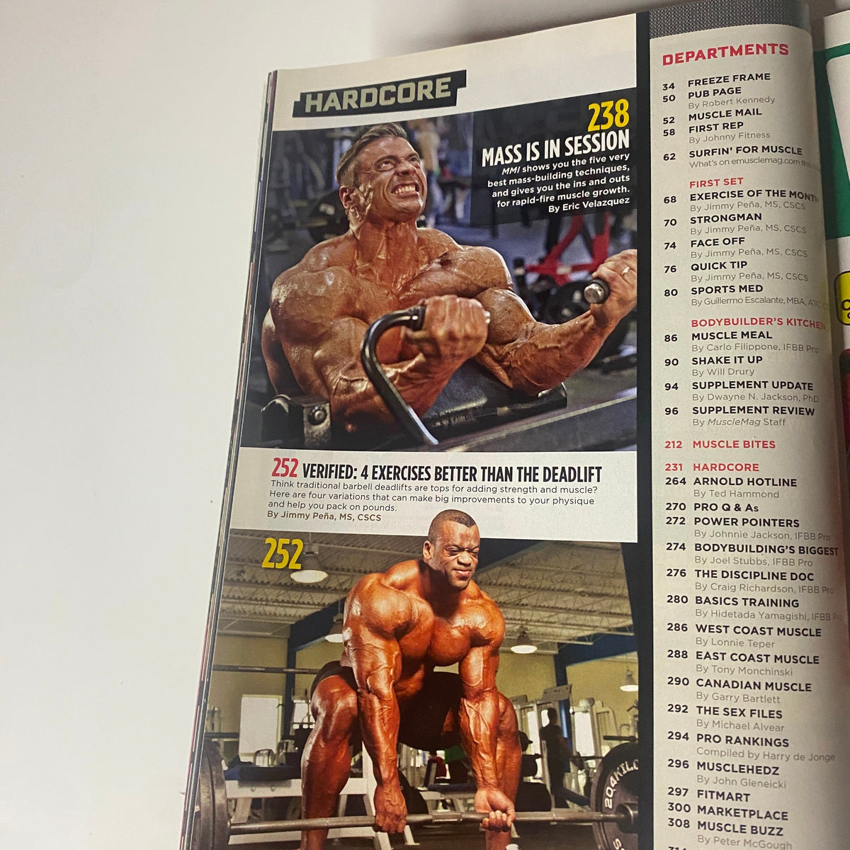 Inside page from MuscleMag Magazine July 2011 displaying a bodybuilding workout feature titled 'Hardcore' with exercises that focus on mass building and deadlift alternatives.