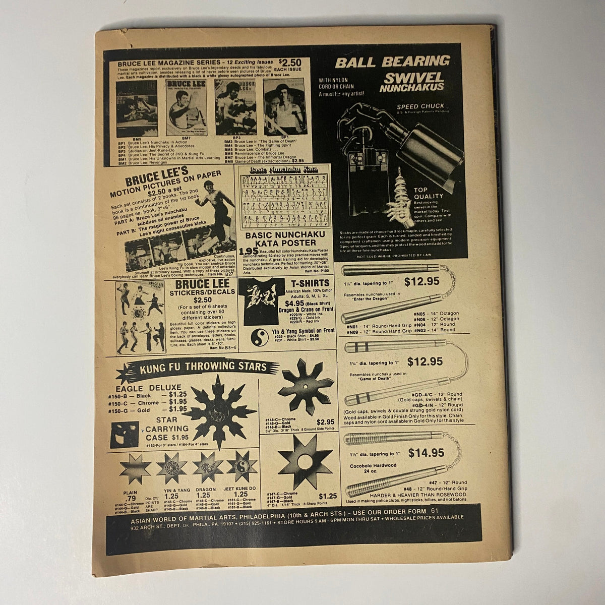 Back cover of Bodybuilder Magazine November 1979 featuring advertisements including Bruce Lee merchandise and nunchaku products, showcasing a vintage design relevant to bodybuilding history.