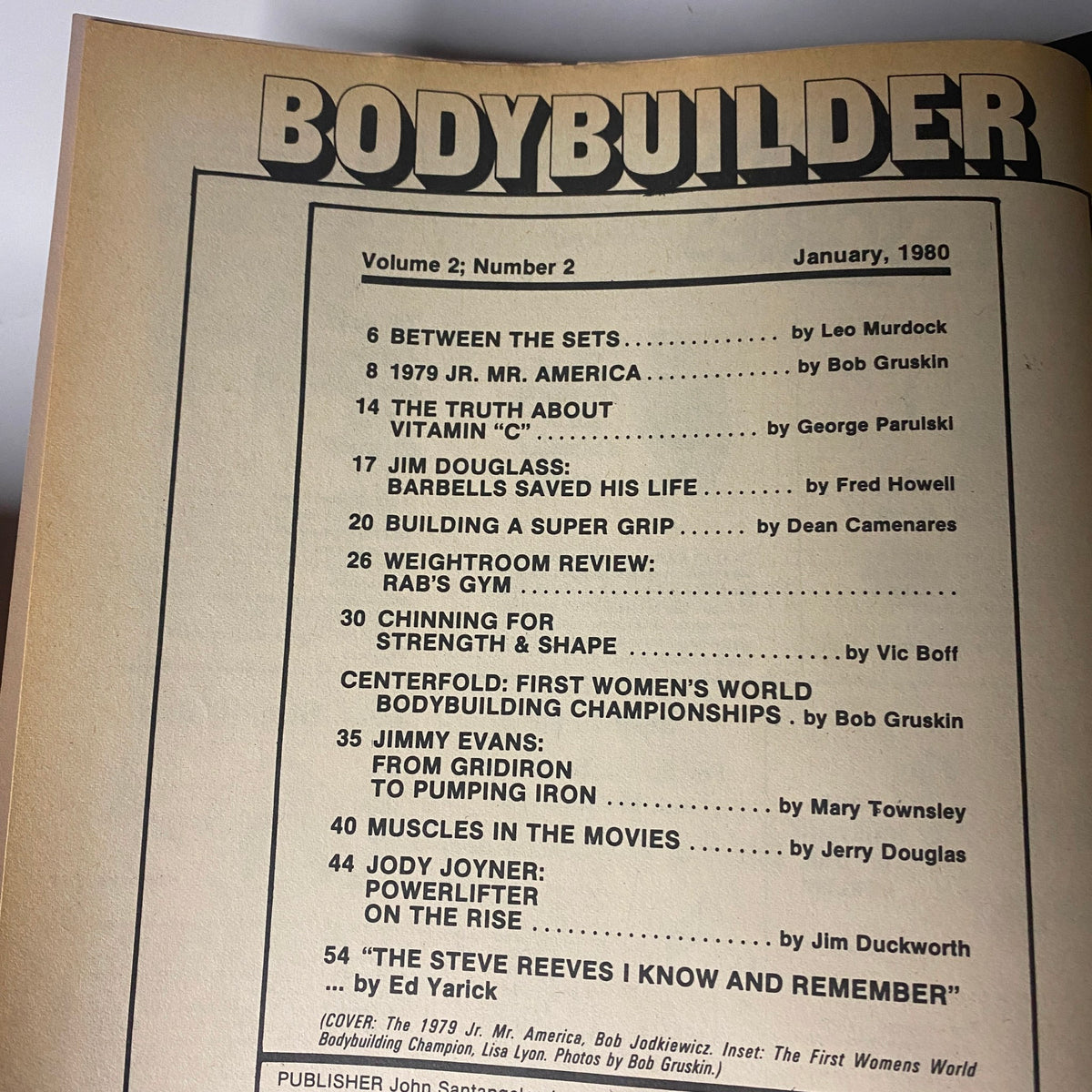 Contents page of Bodybuilder Magazine January 1980, Vol. 2 No. 2, listing articles including 'Between the Sets' and 'The Truth About Vitamin C'.