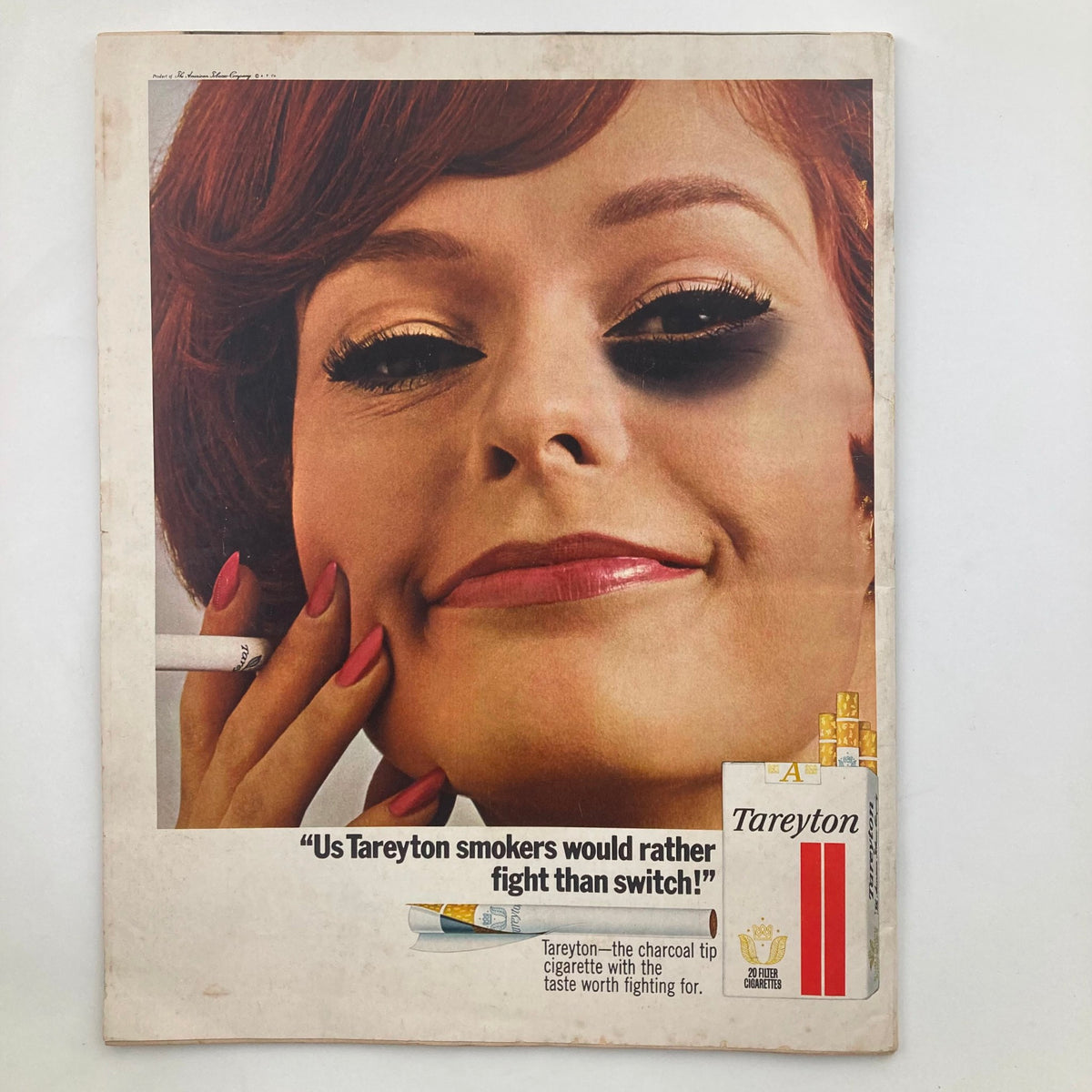 Back cover advertisement of Tareyton cigarettes from Look Magazine January 10, 1967, Vol 31 No. 1, featuring a woman promoting the brand with a playful slogan.