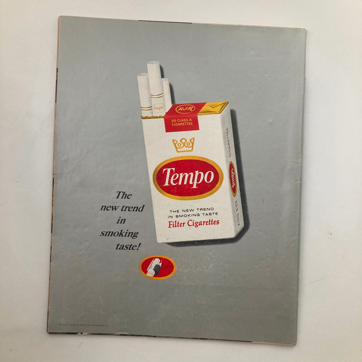 Vintage Tempo Cigarettes Advertisement featuring a pack of Tempo Filter Cigarettes with the tagline 'The new trend in smoking taste' from the VTG Look Magazine February 21 1967, Volume 31, Number 4.