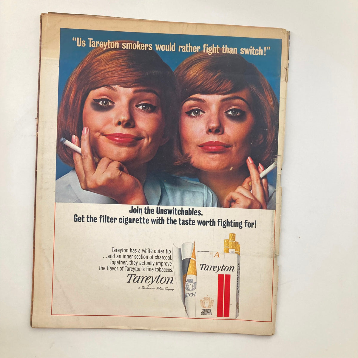 Vintage advertisement from VTG Look Magazine February 8, 1966 featuring two women promoting Tareyton cigarettes with the tagline 'Us Tareyton smokers would rather fight than switch!'. The ad invites readers to join the Unswitchables for a filter cigarette with superior taste.