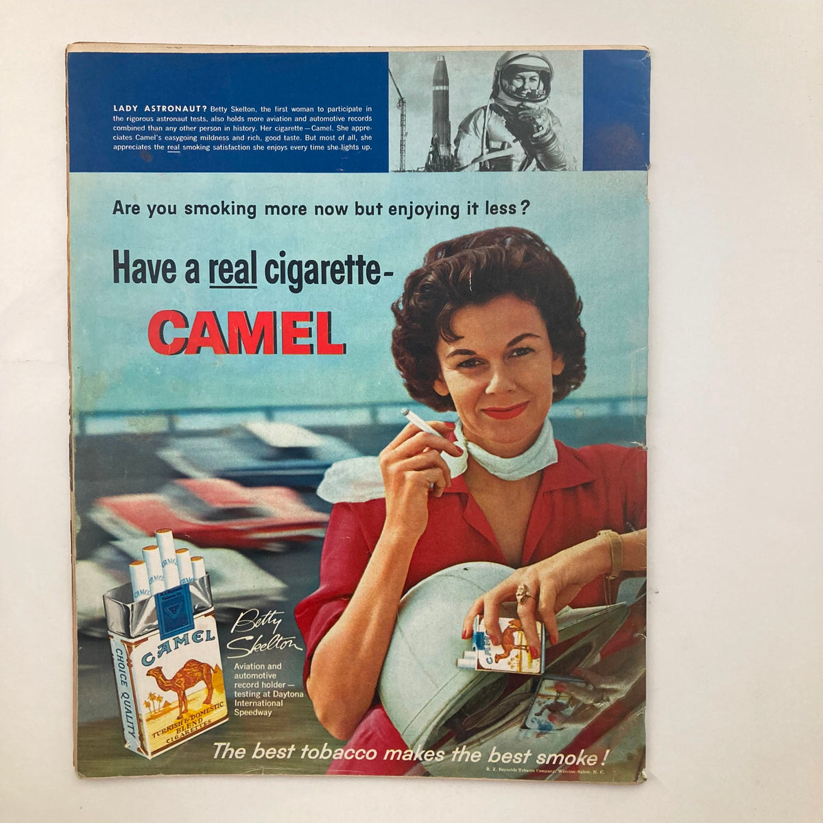 Back cover of Look Magazine January 2, 1962, Vol 26 No. 1 featuring a vintage advertisement for Camel cigarettes with a stylish woman promoting the product.