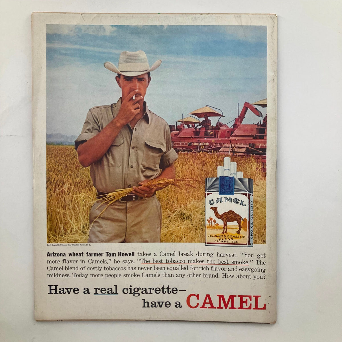 VTG Look Magazine June 10 1958 featuring a vintage advertisement with Arizona wheat farmer Tom Howell holding wheat and smoking a Camel cigarette during harvest. The image depicts farming equipment in the background, capturing the essence of American agriculture and tobacco advertising from the late 1950s.