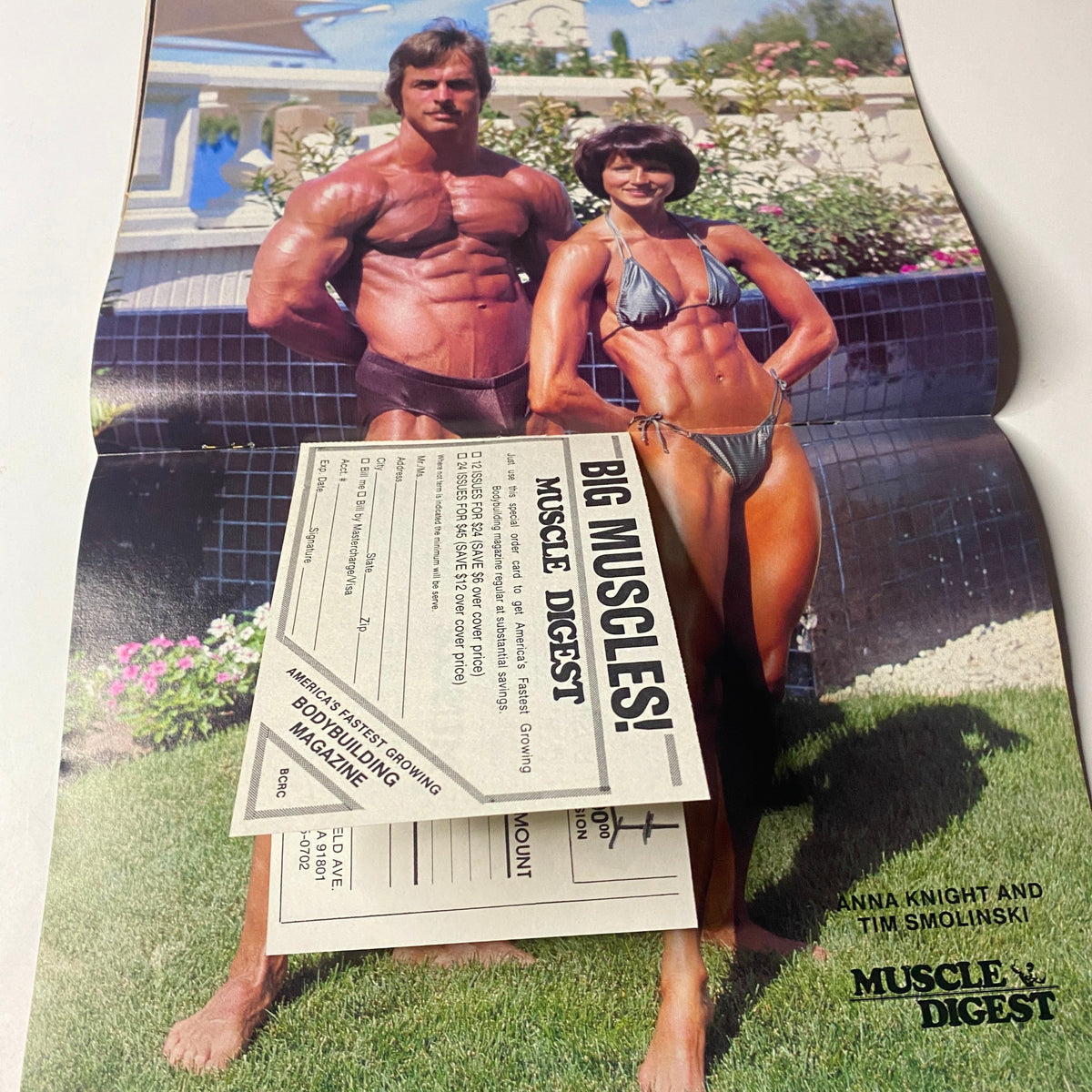 Centerfold of Muscle Digest Magazine October 1982 featuring Anna Knight and T.M. Smolinski in bodybuilding poses, emphasizing the beauty and strength of the athletes.