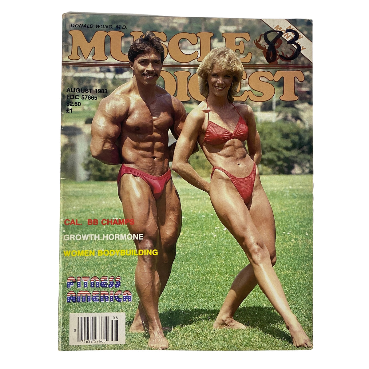 Cover of Muscle Digest Magazine August 1983 featuring Jesse Lujan and Melody Voelker, showcasing their bodybuilding physiques in vibrant red attire.