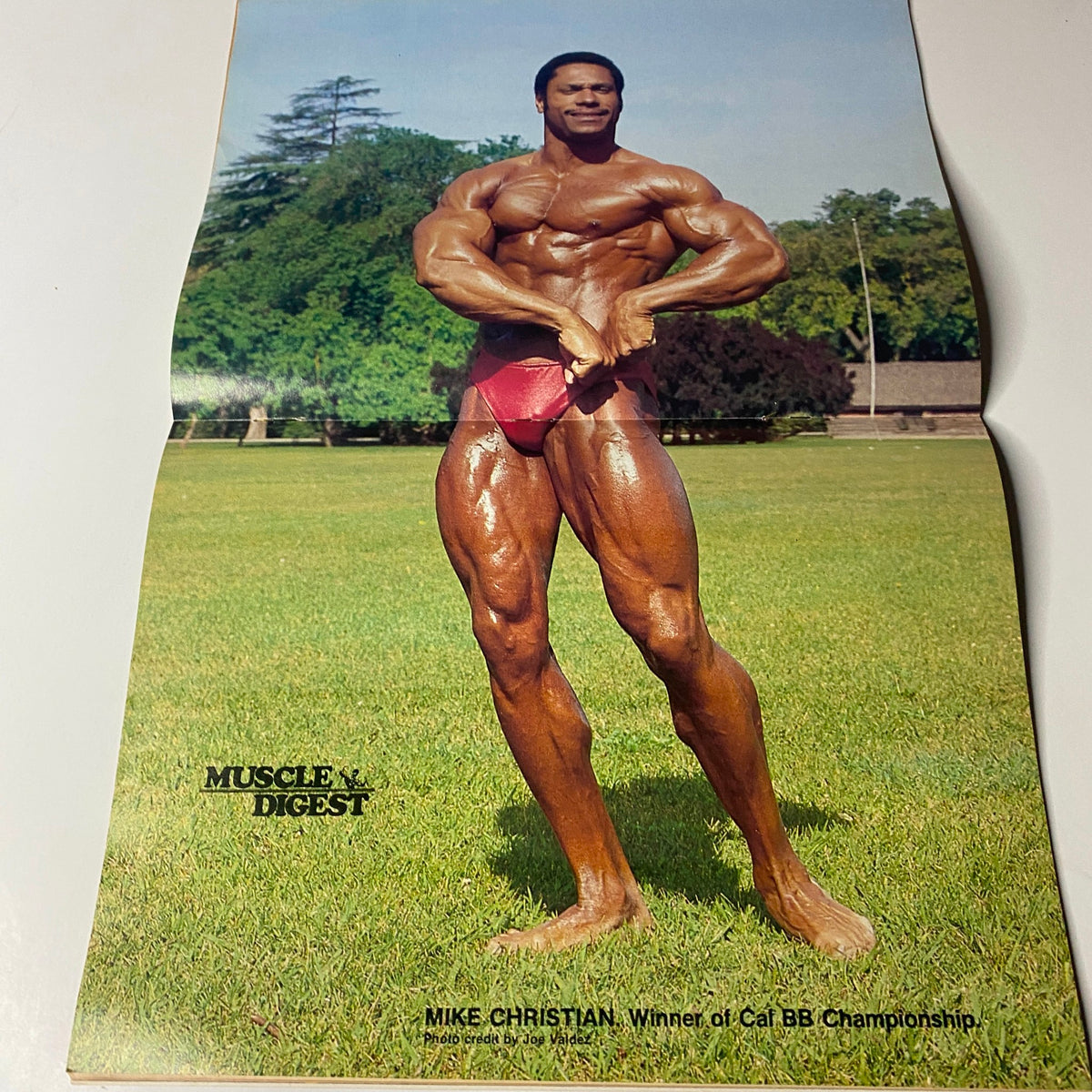 Centerfold of Muscle Digest Magazine August 1983 showcasing Mike Christian, the winner of the California Bodybuilding Championship.