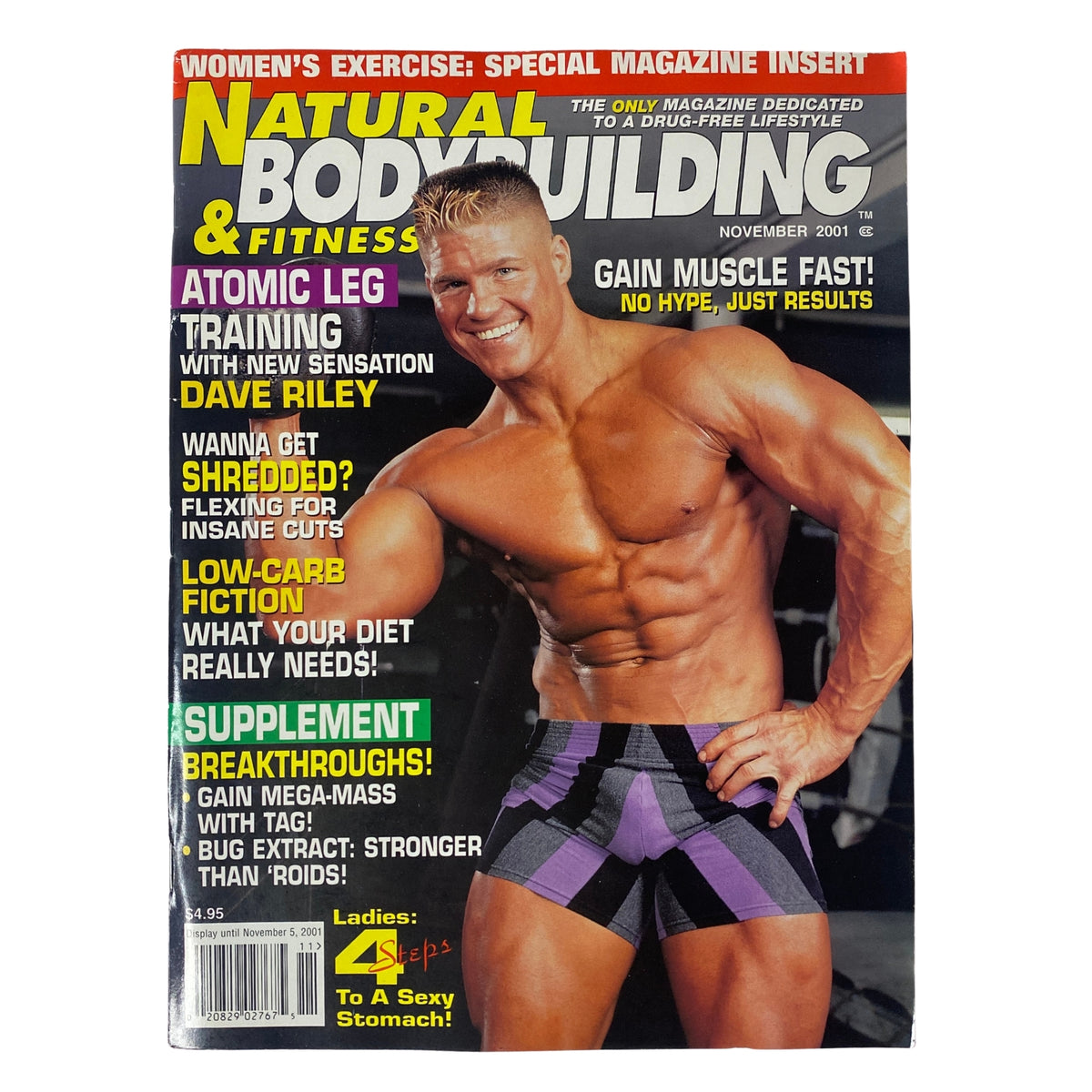 Cover of Natural Bodybuilding & Fitness Magazine November 2001 featuring Dave Riley, highlighting articles on atomic leg training, nutrition, and muscle gain.