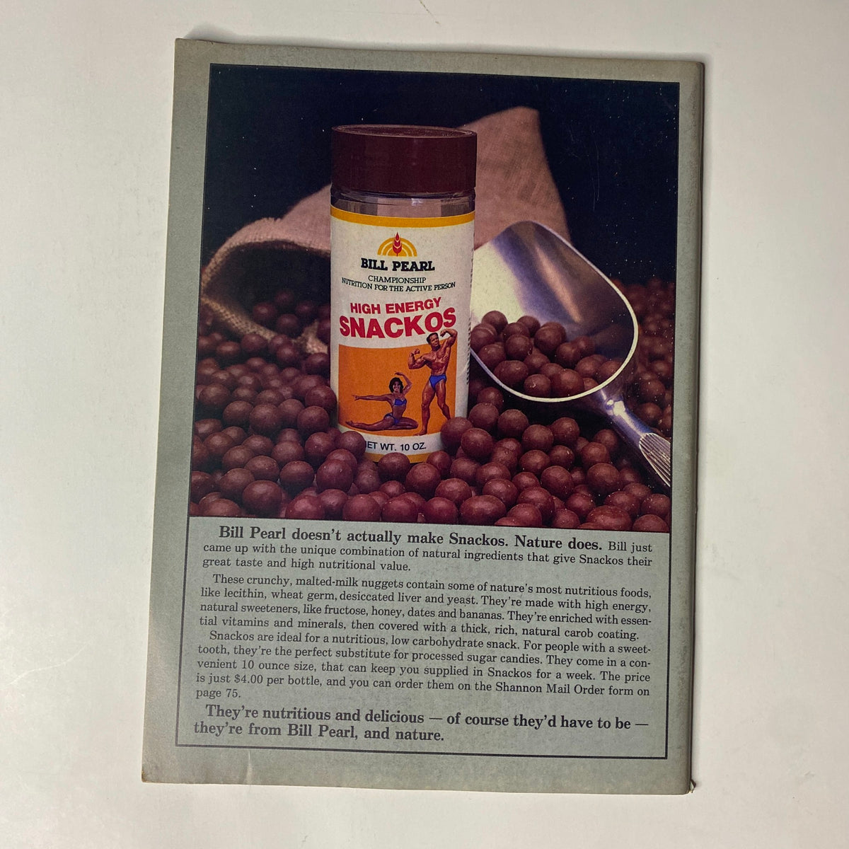 Back cover advertisement from Natural Bodybuilding Magazine April 1983 Vol 2 No 7 promoting Bill Pearl's Snackos, emphasizing natural nutrition for athletes.