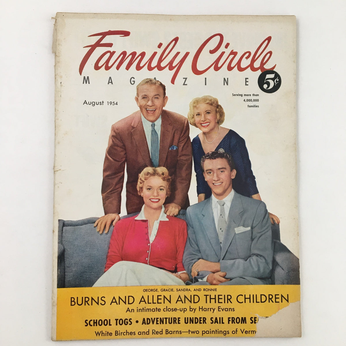 Cover of Family Circle Magazine August 1954 featuring Burns & Allen with their children, showcasing mid-20th century American family values.