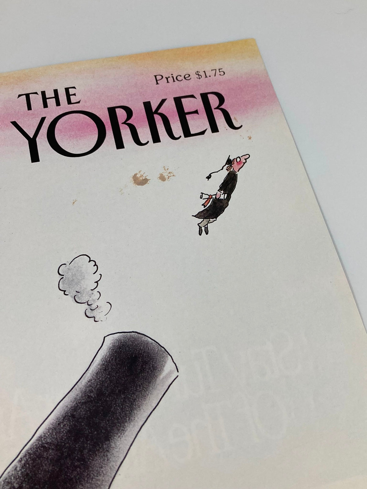 Detail shot of The New Yorker June 4 1990 Graduate with Cannon cover, highlighting the title and an illustration by Arnie Levin, featuring a graduate and whimsical cannon.