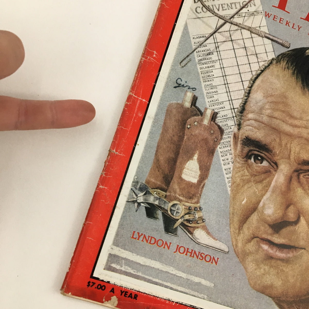 Close-up view of the cover of Time Magazine July 18, 1960, displaying Lyndon Johnson and cowboy boots, with emphasis on the 'Democrats in Los Angeles' headline.