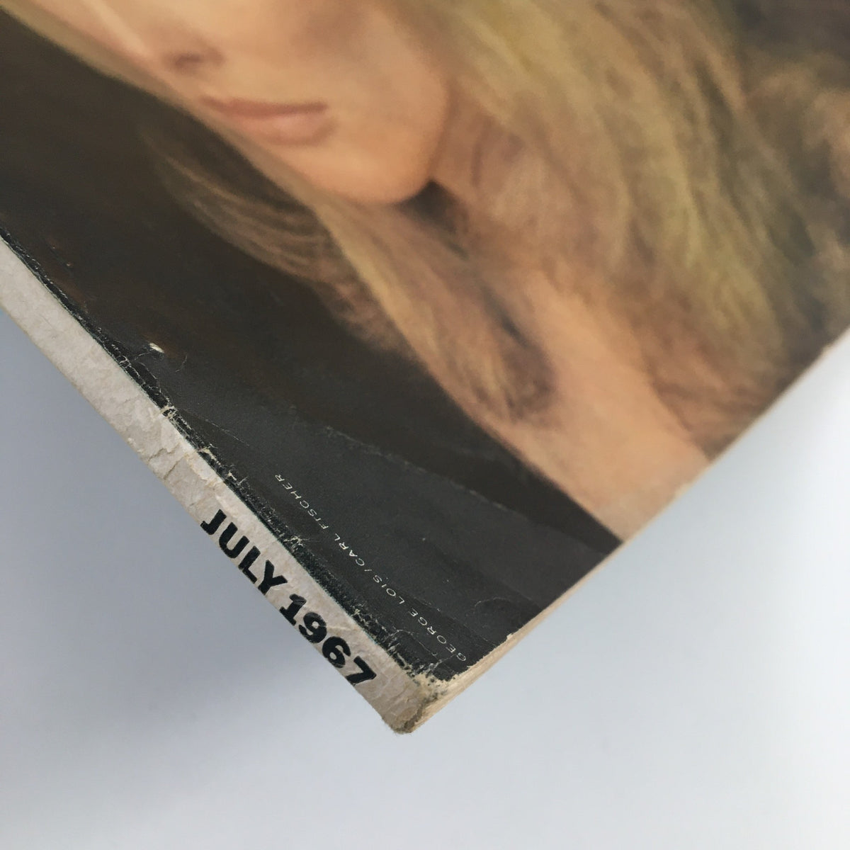 Side view of the cover of Esquire Magazine July 1967 showing the publication date, highlighting its vintage appeal.