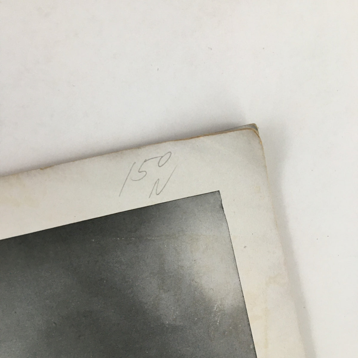 Interior corner of France Illustration Magazine June 1949, showing handwritten notes and a black and white photo on a page.