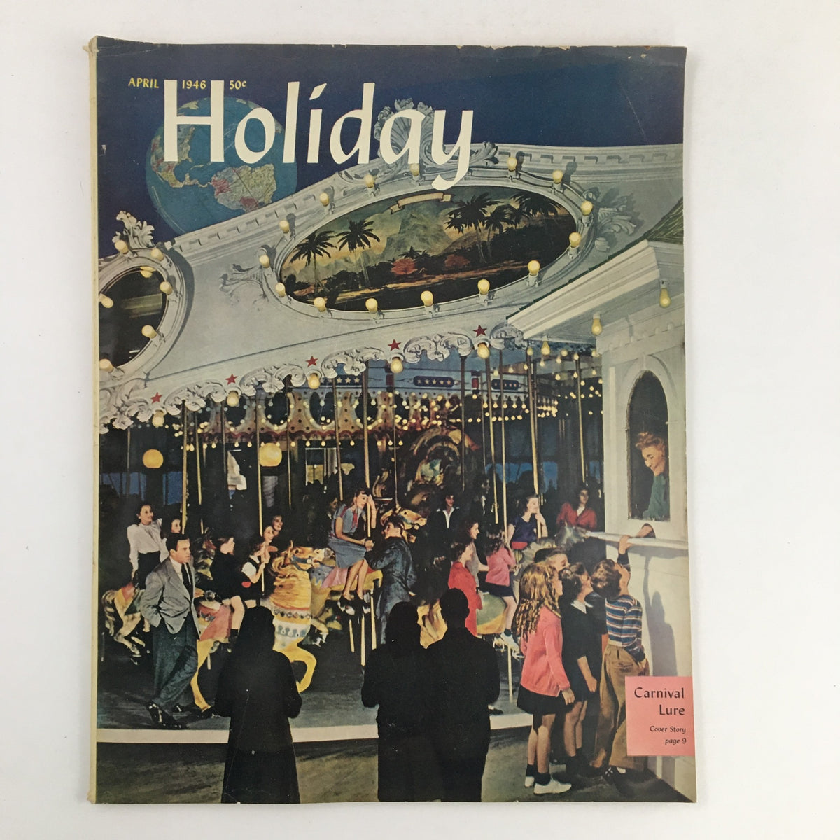 Cover image of Holiday Magazine April 1946 featuring a vibrant carnival scene with children and adults enjoying a carousel, emphasizing the theme of Carnival Lure and Cherry Blossoms.