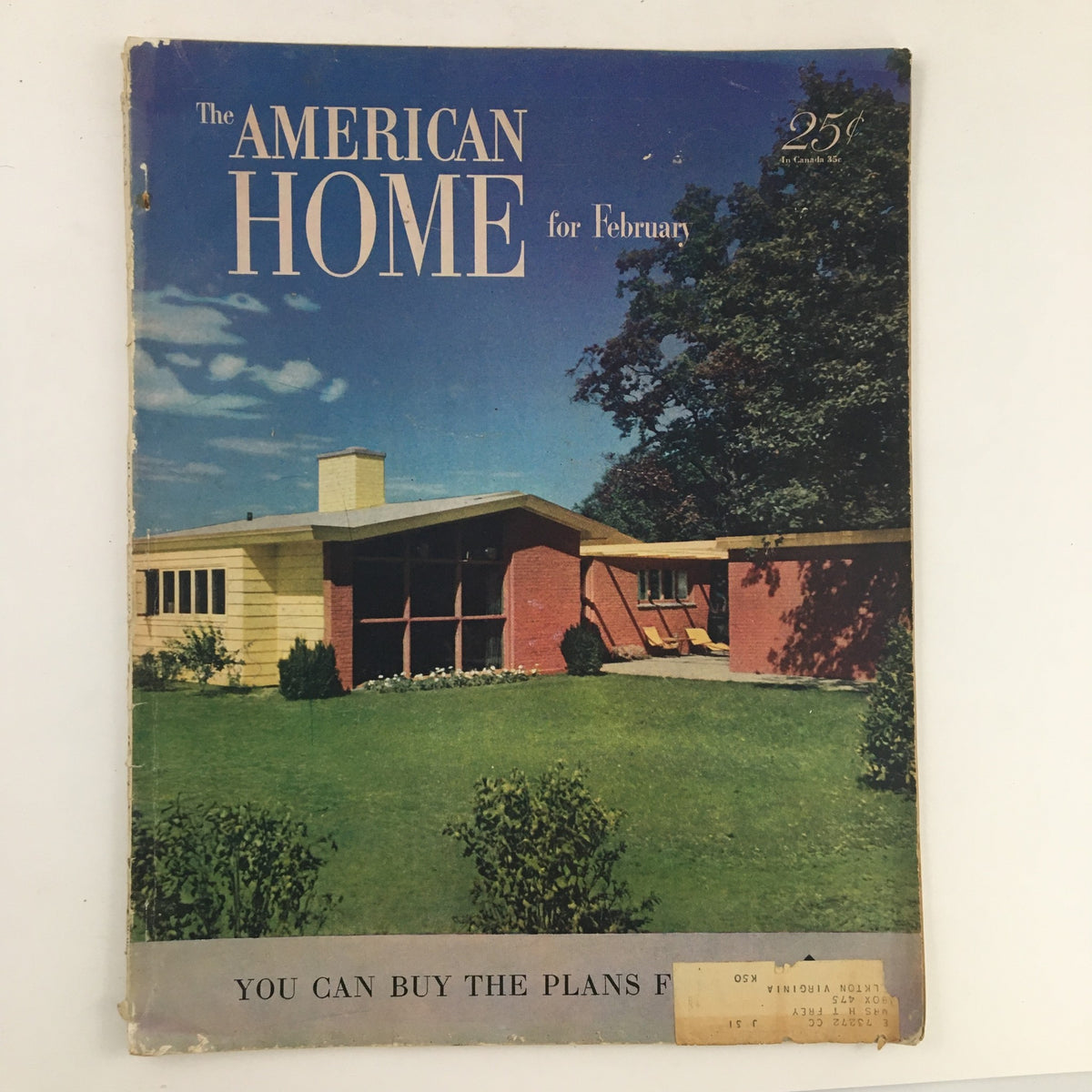 Cover of The American Home Magazine February 1951 featuring a vintage home exterior and garden, prominently displaying the title and showcasing mid-century design.