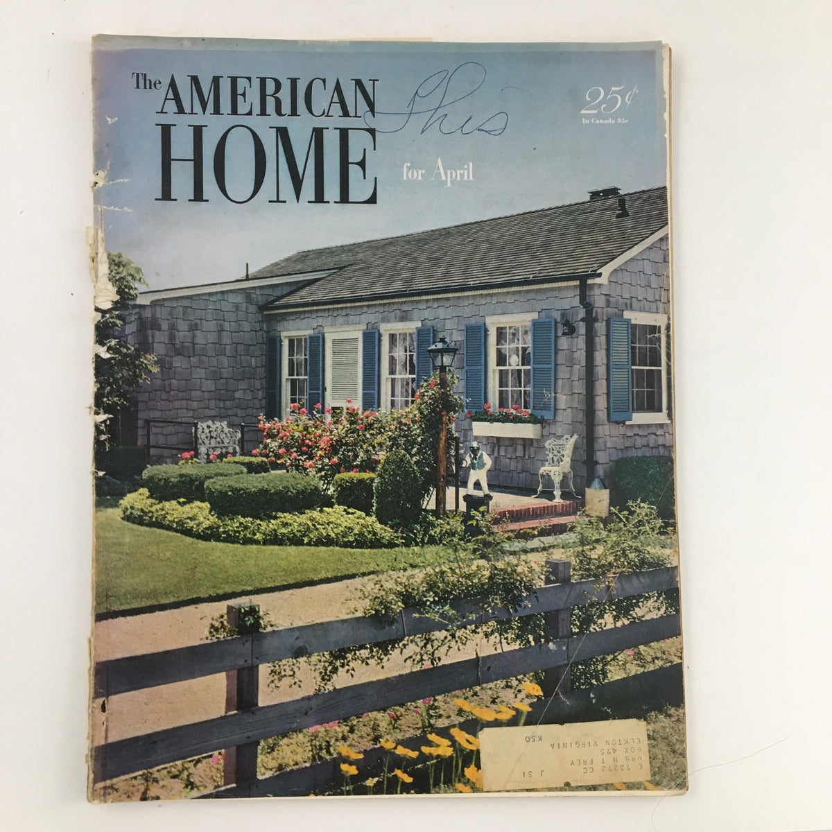 Cover image of The American Home Magazine April 1951, featuring a charming house with blue shutters and a well-maintained garden.