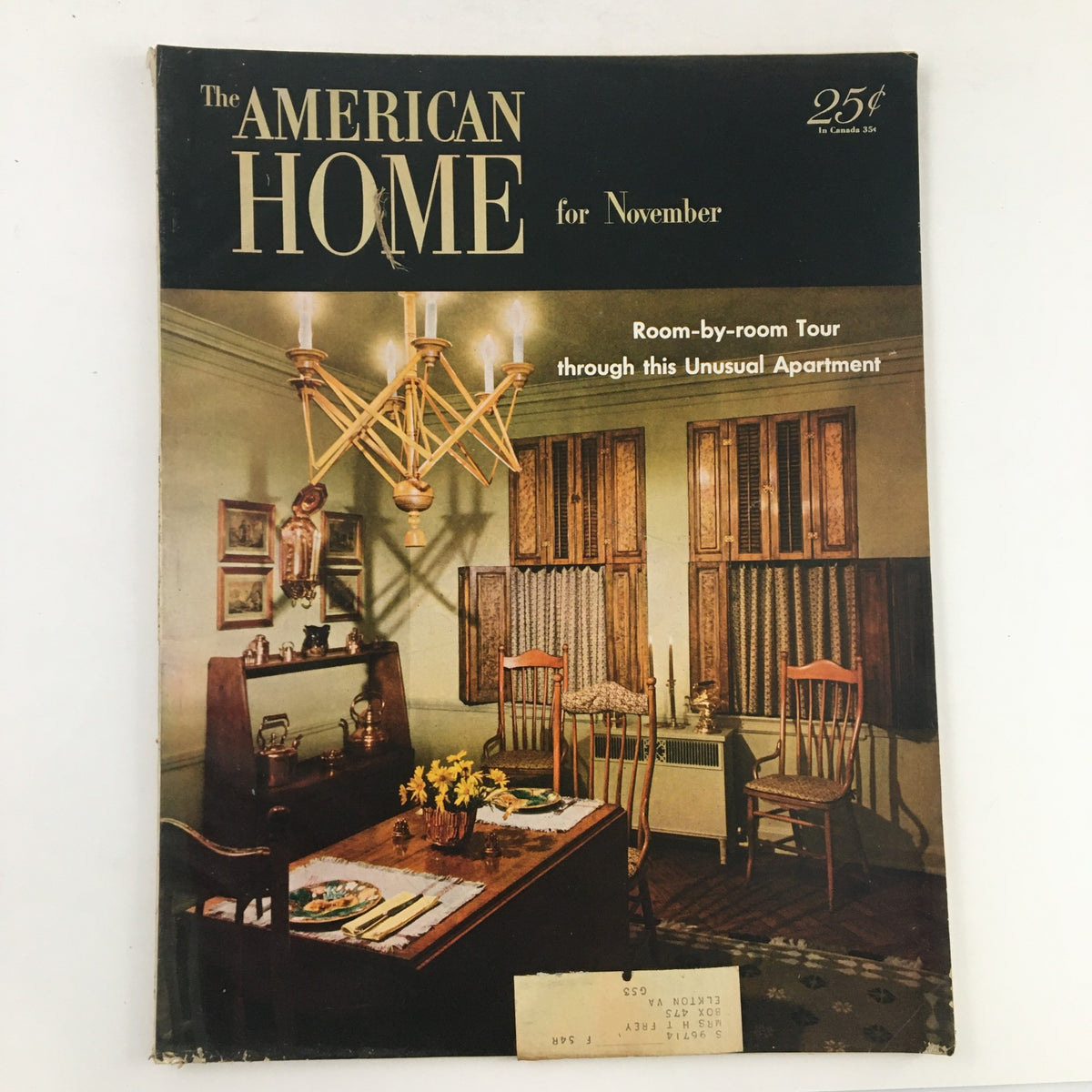 Cover of The American Home Magazine November 1953 featuring a dining room scene with vintage decor and a chandelier, showcasing interior design ideas.