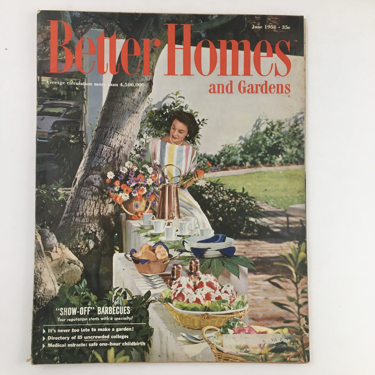 Cover of Better Homes & Gardens June 1958 magazine featuring a woman setting a table outdoors surrounded by flowers, celebrating the 1950s baking culture with Dad's Favorite Triple Chocolate Cake recipe.