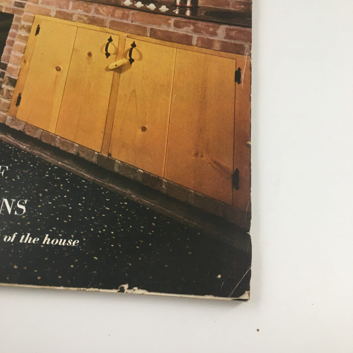 Image of the House Beautiful Magazine January 1952, featuring a vintage pass-through counter and kitchen design, reflecting mid-century American interior style.