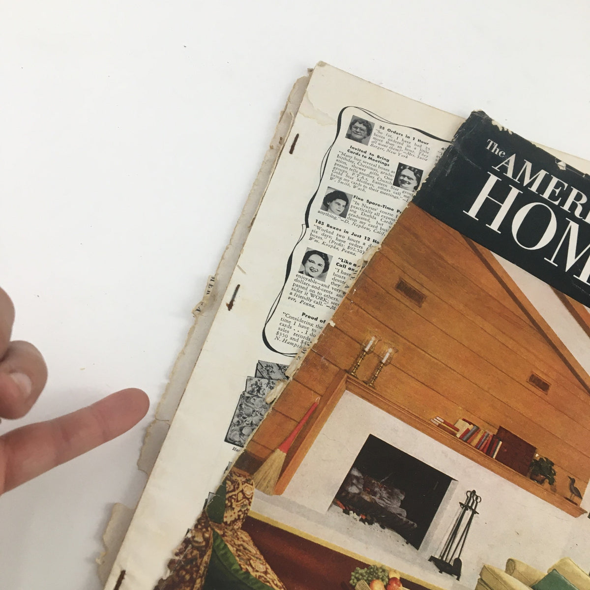 Close-up view of the spine of American Home Magazine January 1951, revealing magazine wear and age, emphasizing its vintage collectible status.