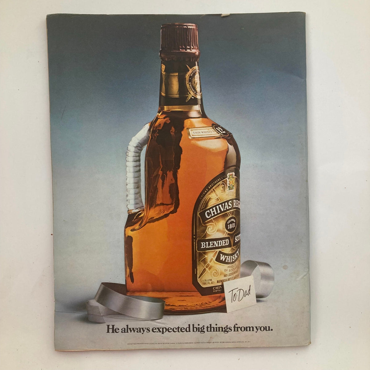 VTG Life Magazine June 1983 cover featuring George Lucas, showcasing the master filmmaker along with a striking image of a Chivas Regal whiskey bottle with a sentimental note.