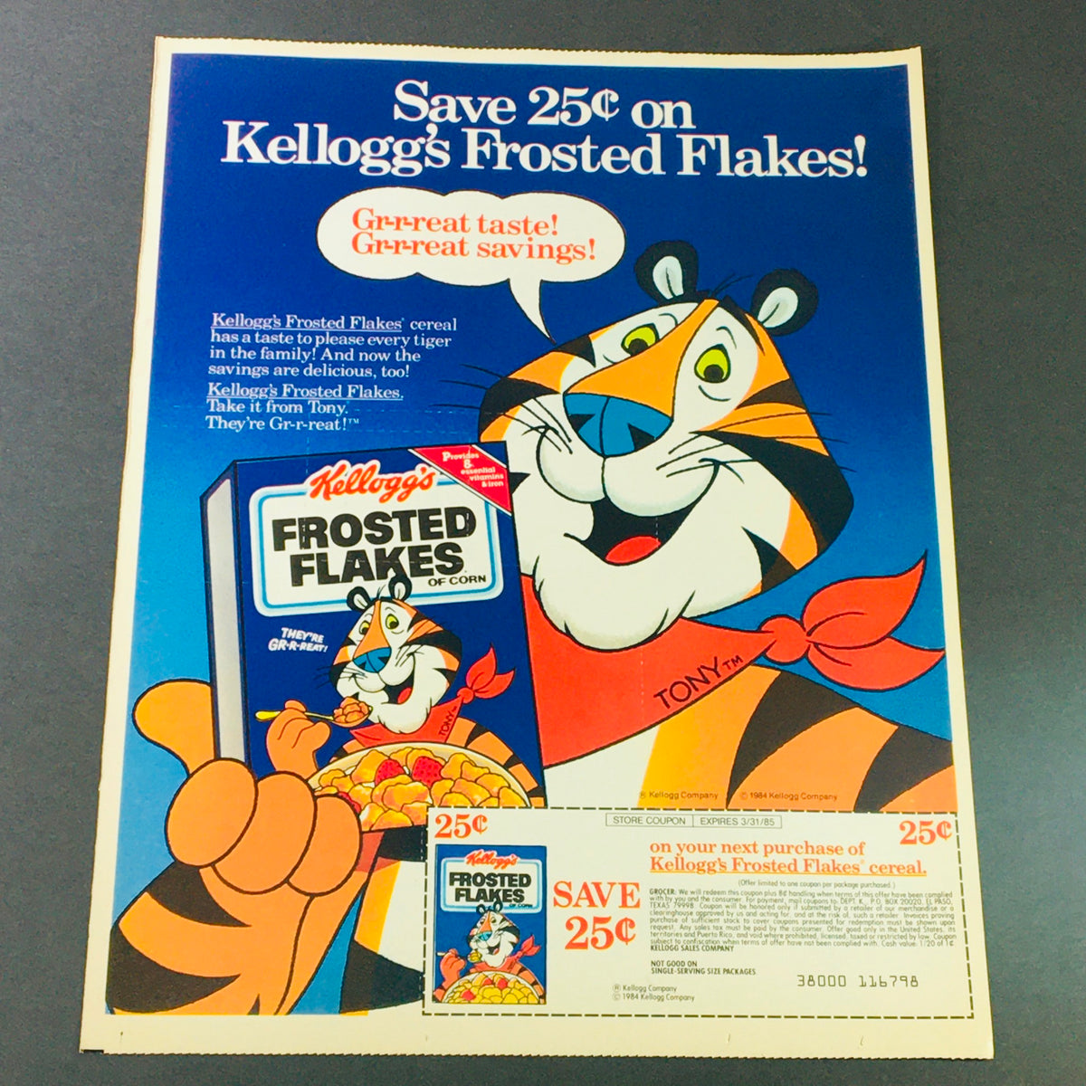 Vintage 1984 Kellogg's Frosted Flakes cereal advertisement featuring Tony the Tiger, showcasing a coupon to save 25 cents on the purchase of Kellogg's Frosted Flakes. The ad highlights its great taste and offers a colorful, retro design.