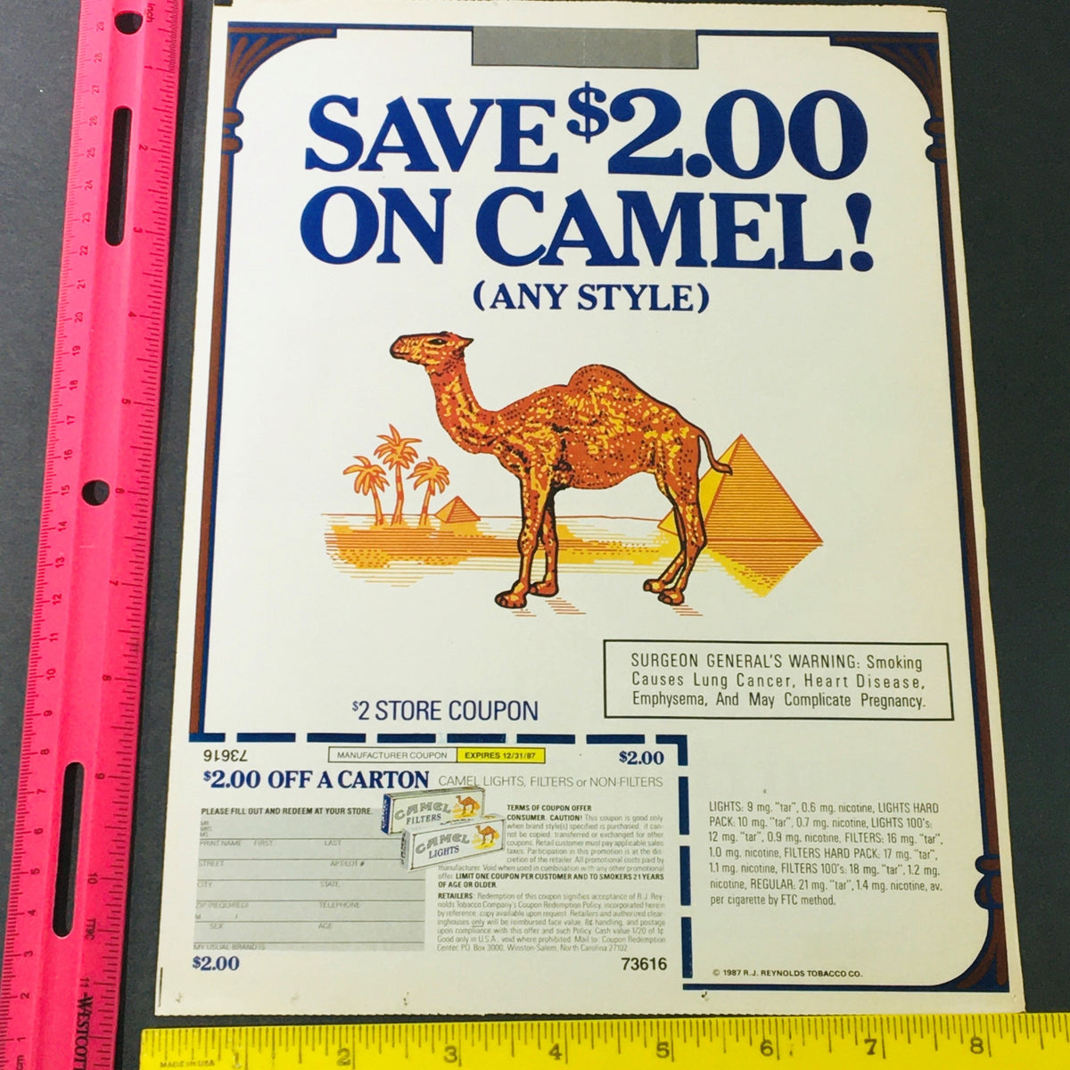 VTG Retro 1987 Reynolds Tobacco Co. Save $2.00 on Camel Cigarettes coupon featuring a stylized camel image. Original coupon condition, not a reprint.