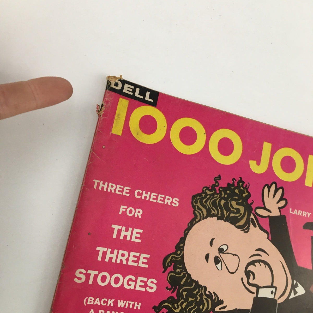 Cover detail of 1000 Jokes Magazine No. 91 September 1959 featuring a playful illustration of a Three Stooges character and the title 'Three Cheers for The Three Stooges'.