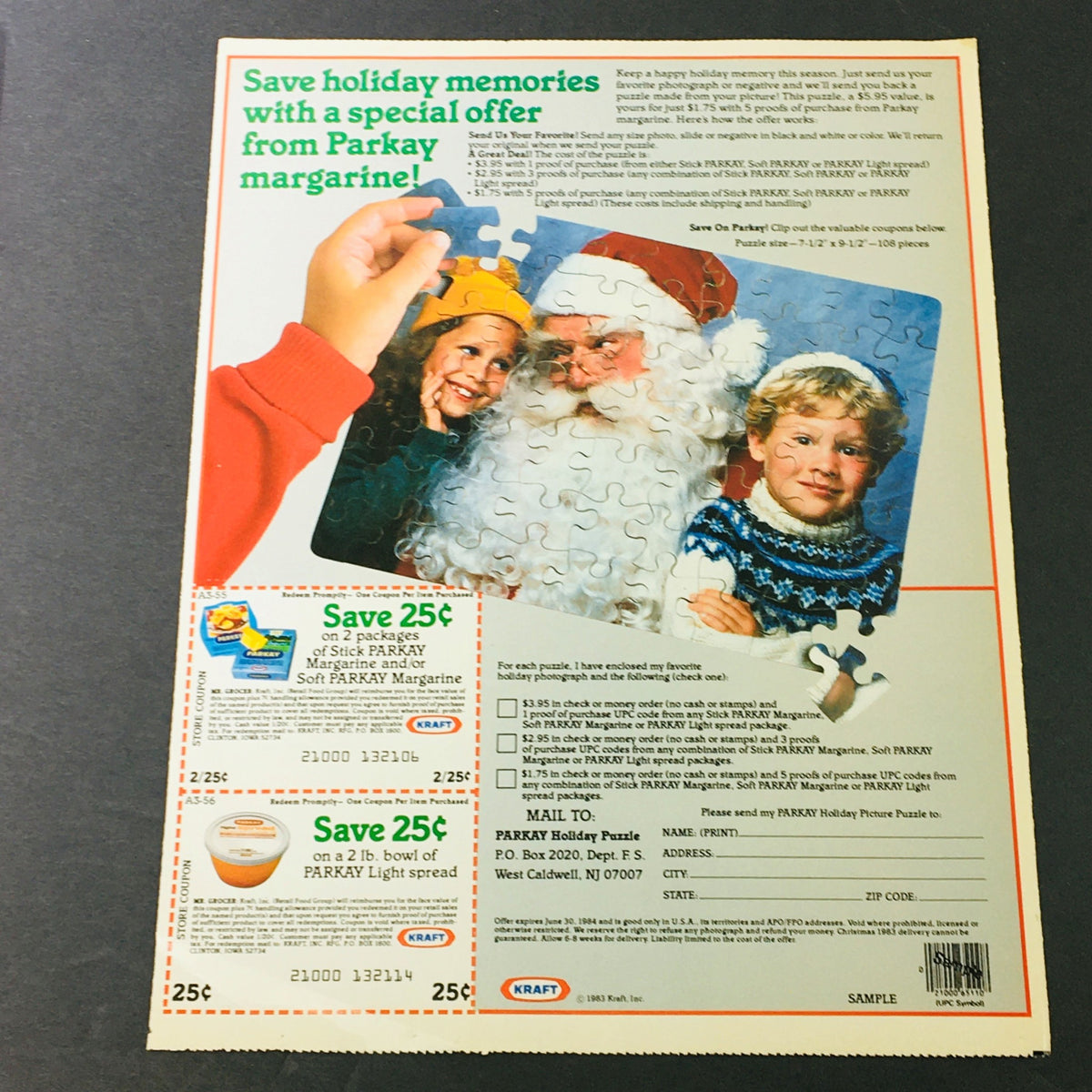 VTG Retro 1983 Kraft from Parkay Margarine Holiday Puzzle Print Ad Coupon featuring a festive holiday scene with children and Santa Claus, promoting a special offer from Parkay Margarine. The ad showcases a vintage puzzle theme and includes a coupon for savings.