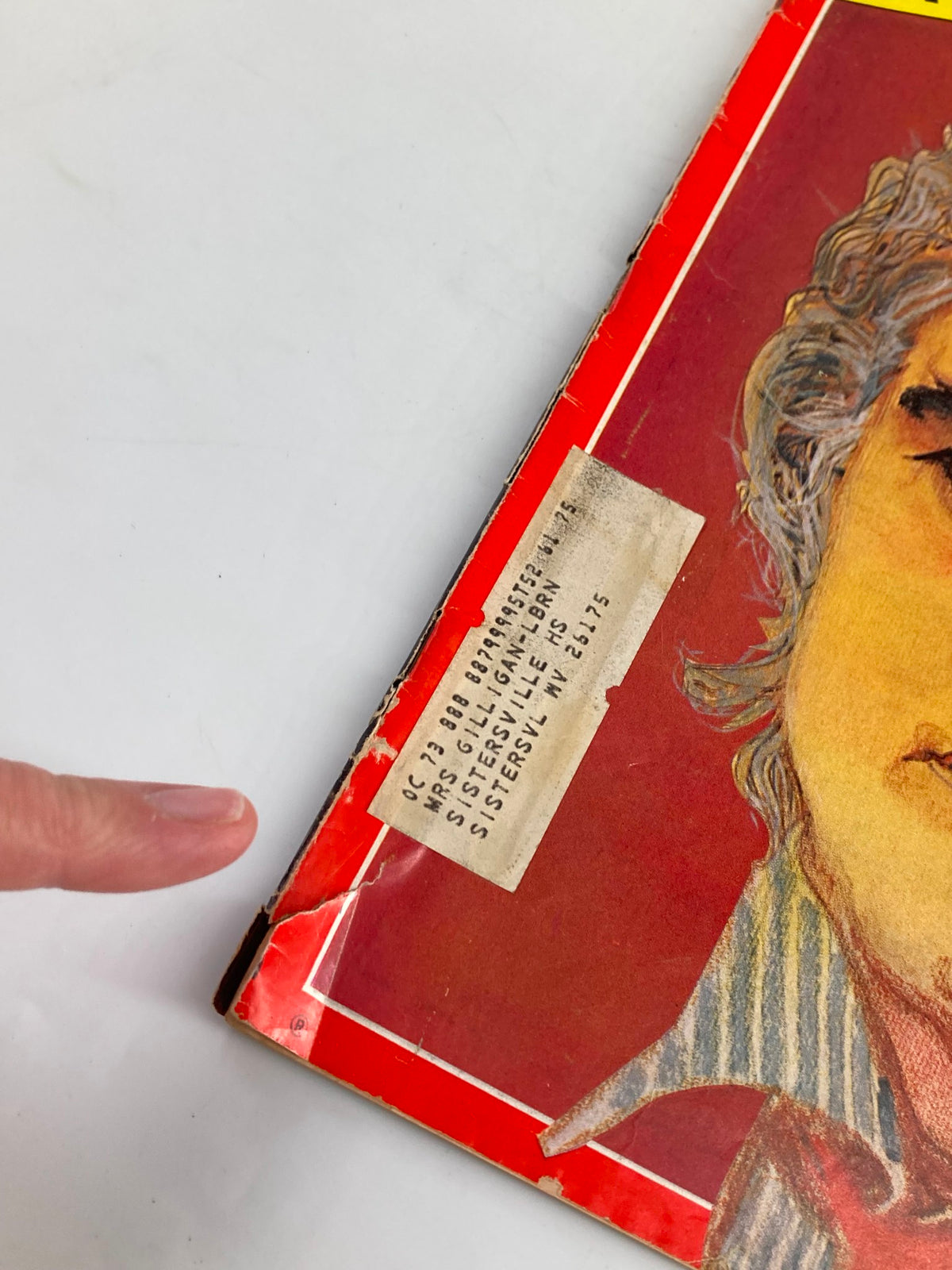Close-up of the edge of VTG Time Magazine January 22, 1973 displaying Marlon Brando in 'Last Tango', featuring an address label with visible wear typical for vintage magazines.