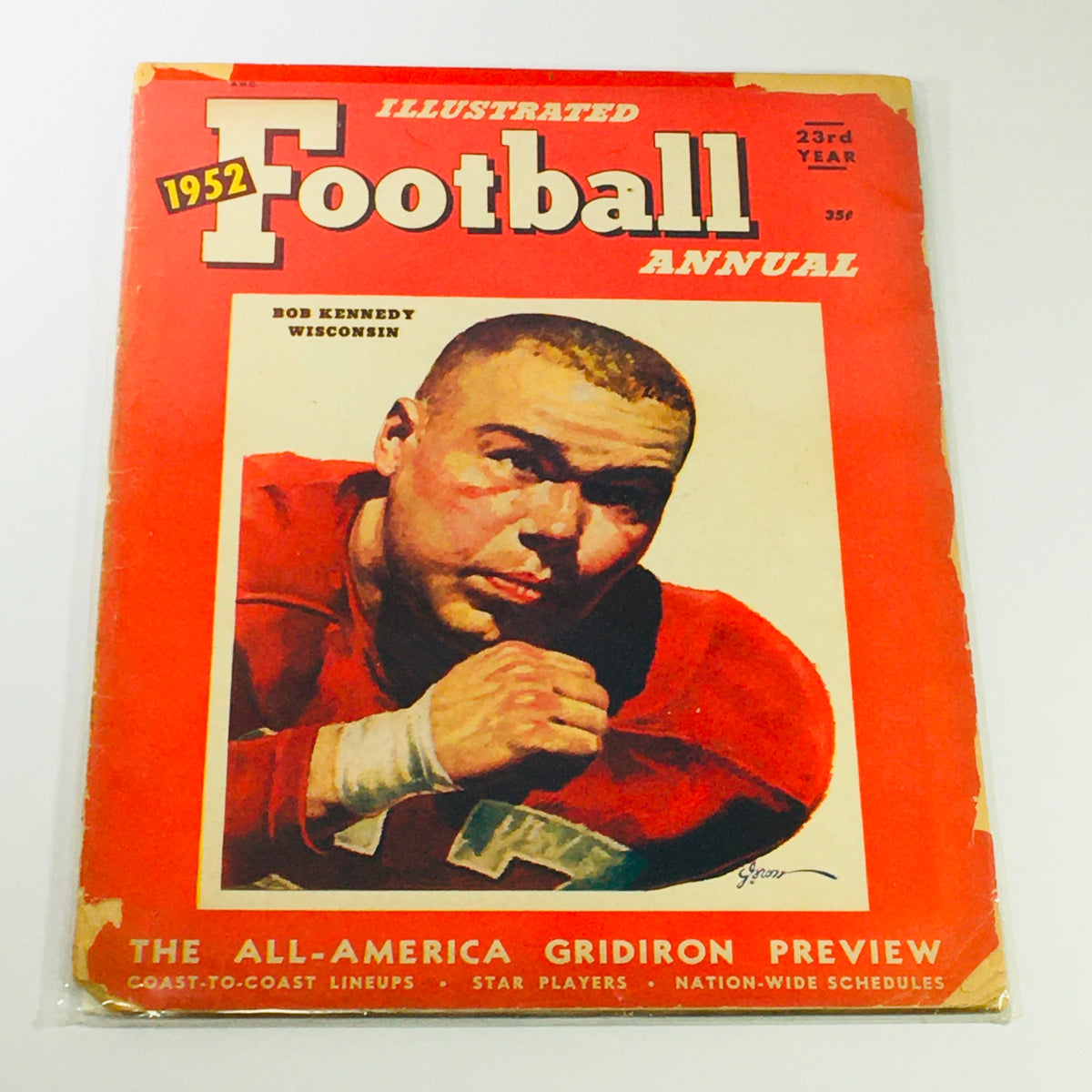 VTG Illustrated Football Annual Magazine 1952 featuring Bob Kennedy of Wisconsin on the cover, showcasing a vintage illustration and text highlighting the annual's significance in football history.
