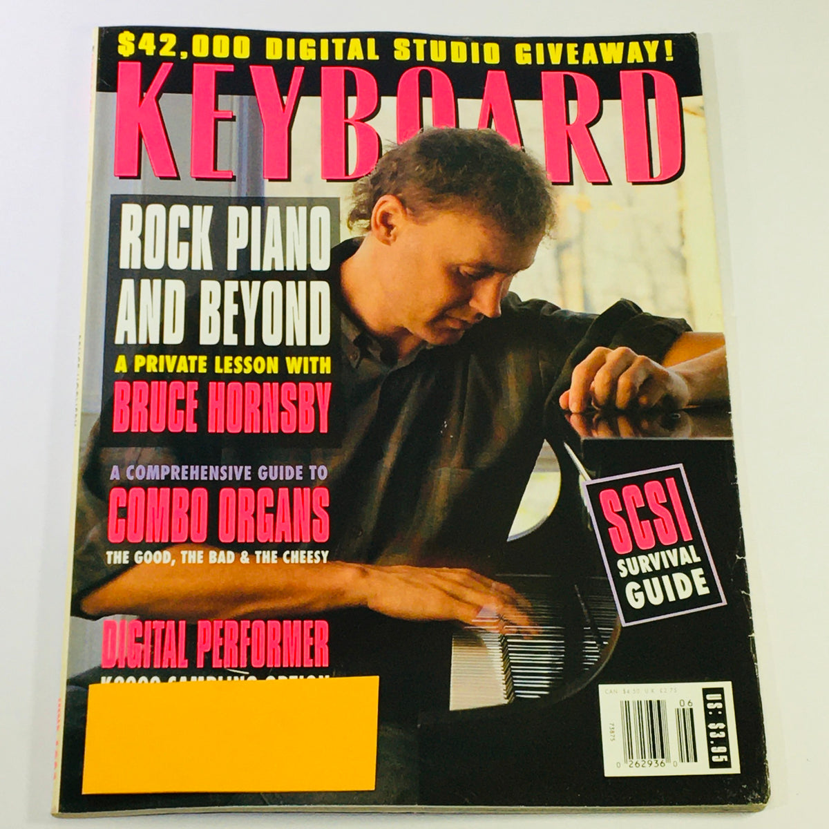 Cover of Keyboard Magazine June 1993 featuring Bruce Hornsby in a private lesson on rock piano and combo organs. Includes headlines about a digital studio giveaway and a survival guide.