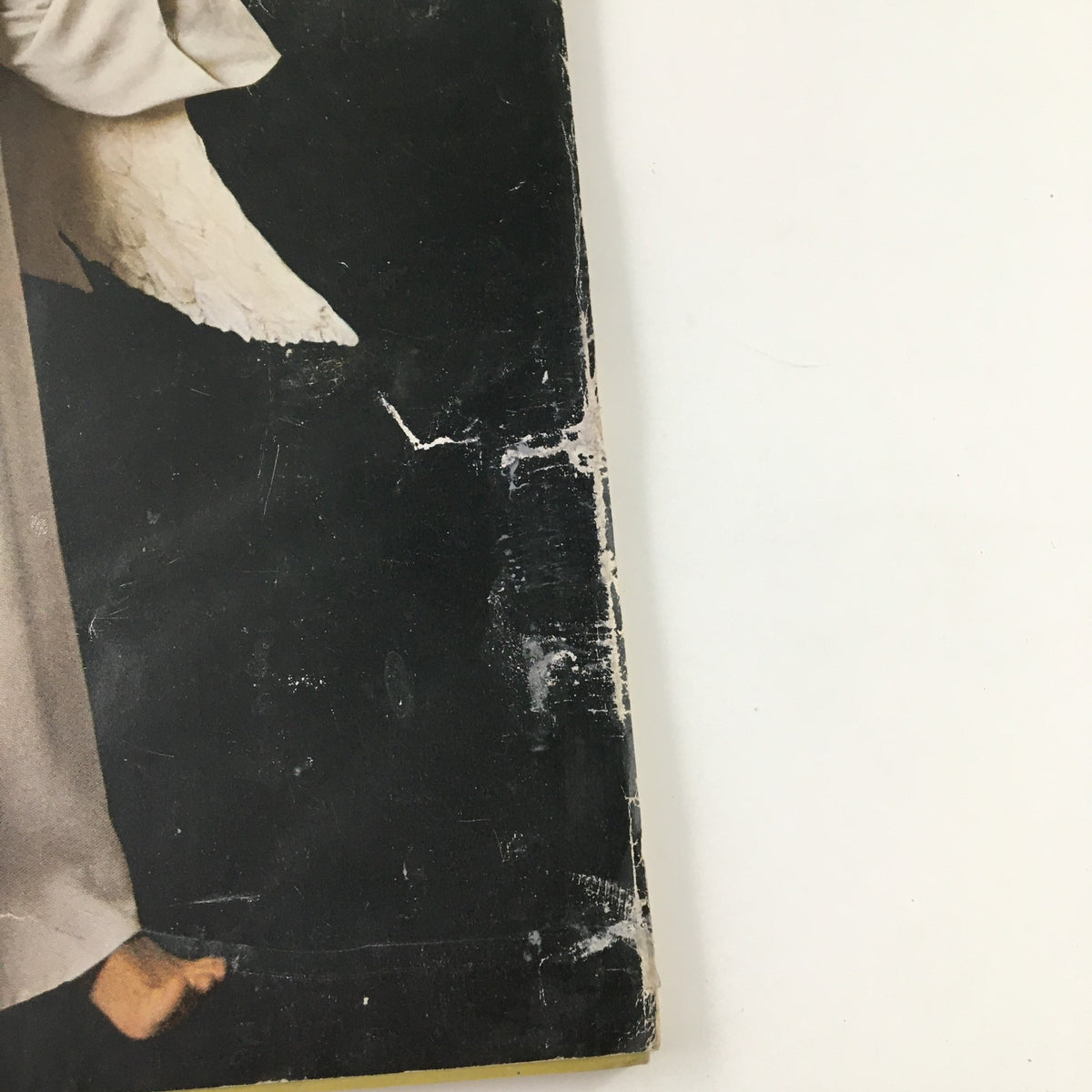 Cover detail of McCall's Magazine December 1963, featuring a beautifully illustrated angel with wings against a dark background.