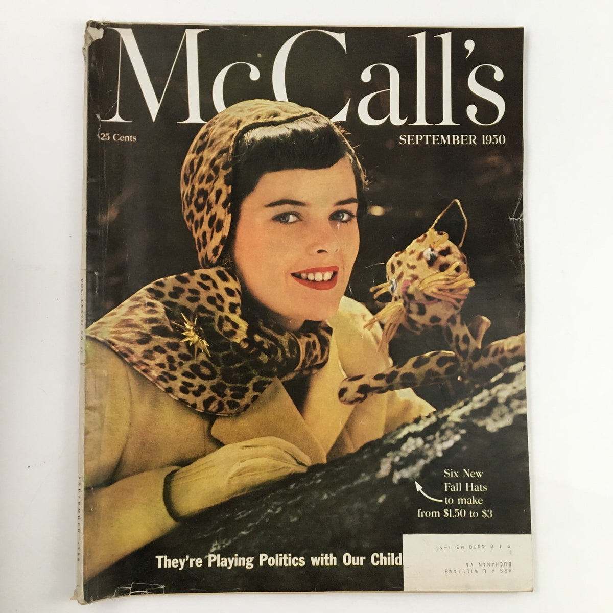 Cover of McCall's Magazine from September 1950 featuring the title 'They're Playing Politics with Our Children,' showcasing a woman in leopard print attire and a playful leopard toy.