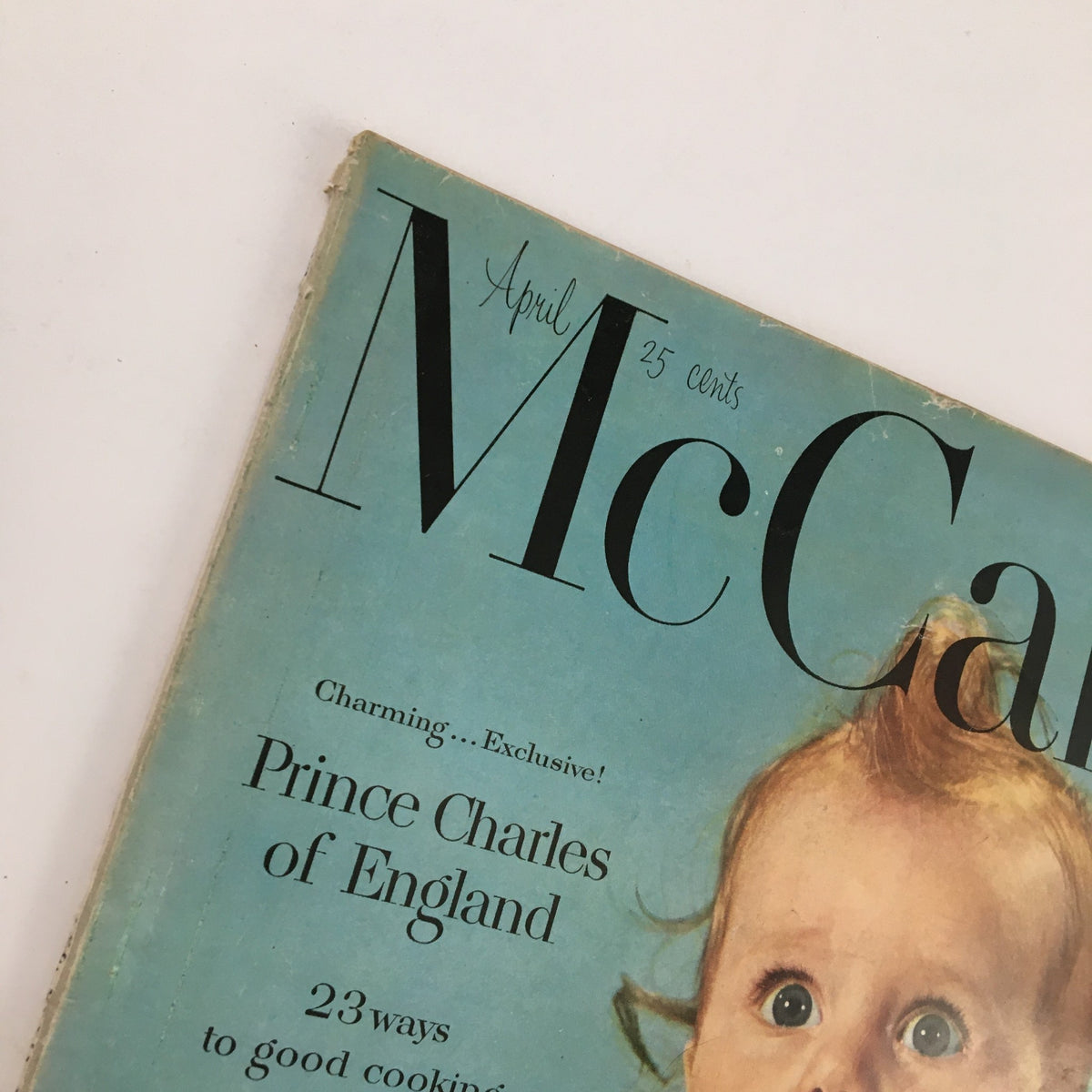 Close-up of the cover of McCall's Magazine April 1952 highlighting the title and featured article about Prince Charles of England. An example of vintage media from the 1950s.