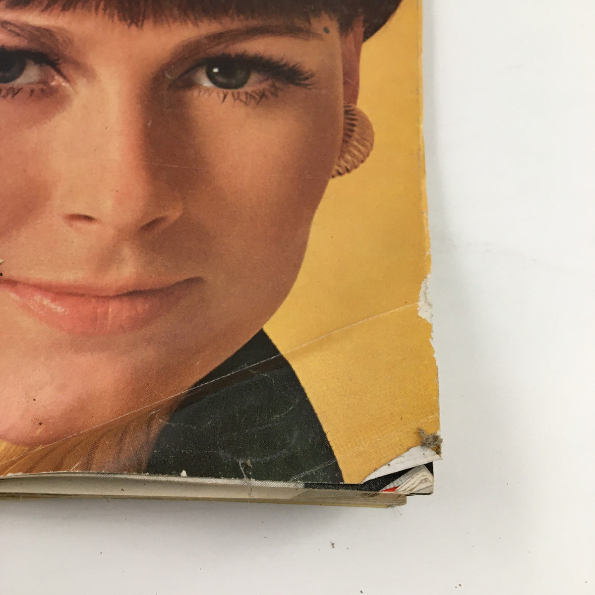 Close-up view of the cover of McCall's Magazine September 1966, highlighting the details of Mamie Eisenhower's feature on 50 years of marriage, alongside a vintage hair and makeup style.
