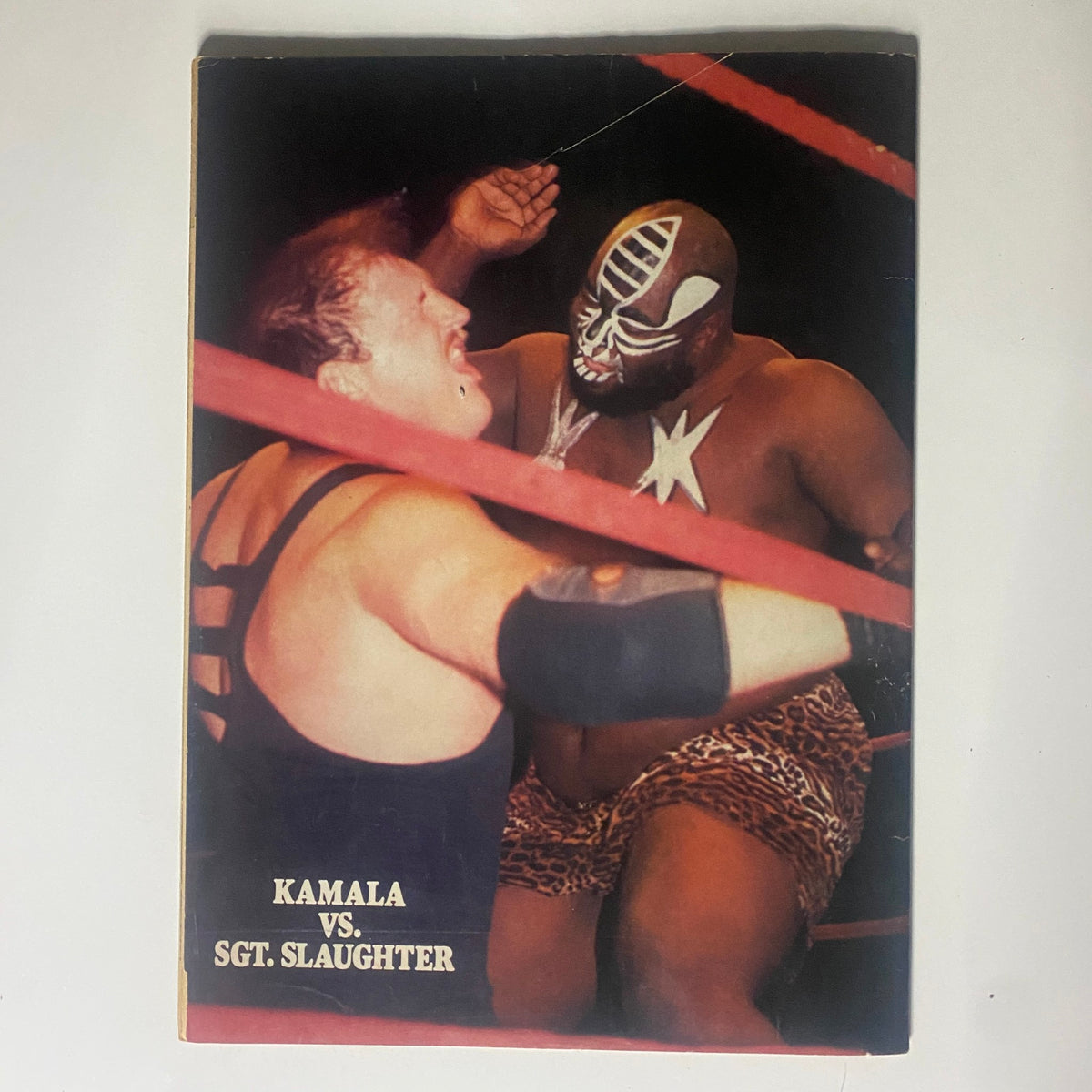Back cover of the Vintage Wrestling World Magazine December 1985 highlighting the match between Kamala and Sgt. Slaughter.