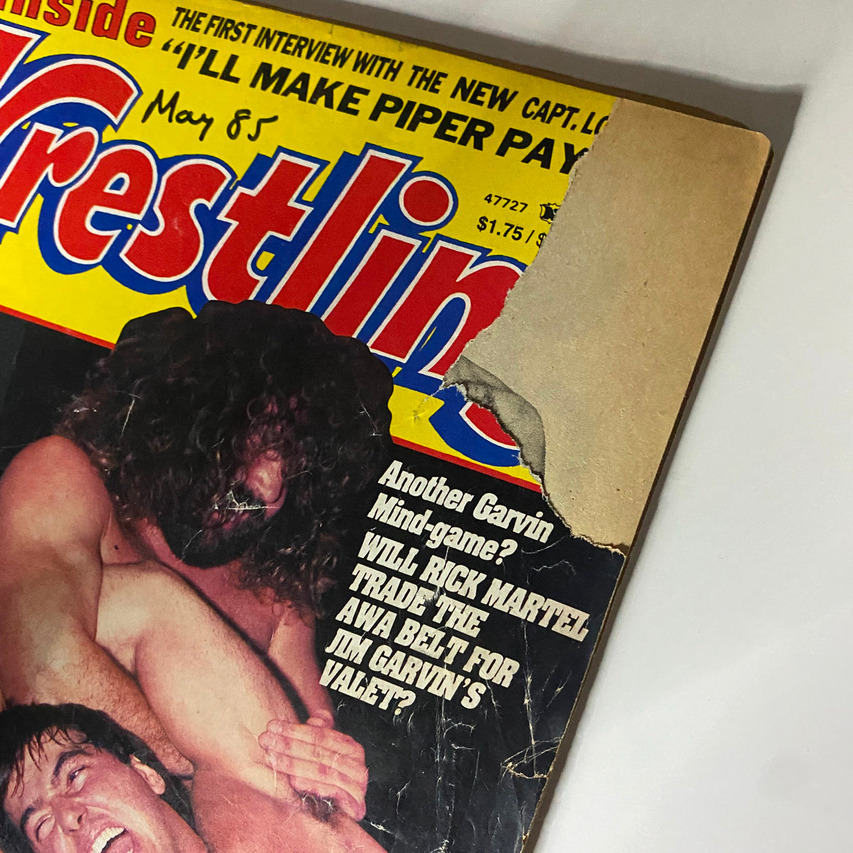 Close-up of the VTG Inside Wrestling Magazine May 1985 cover, showcasing details of Rick Martel vs. Jimmy Garvin and featuring promotional text about the issue.