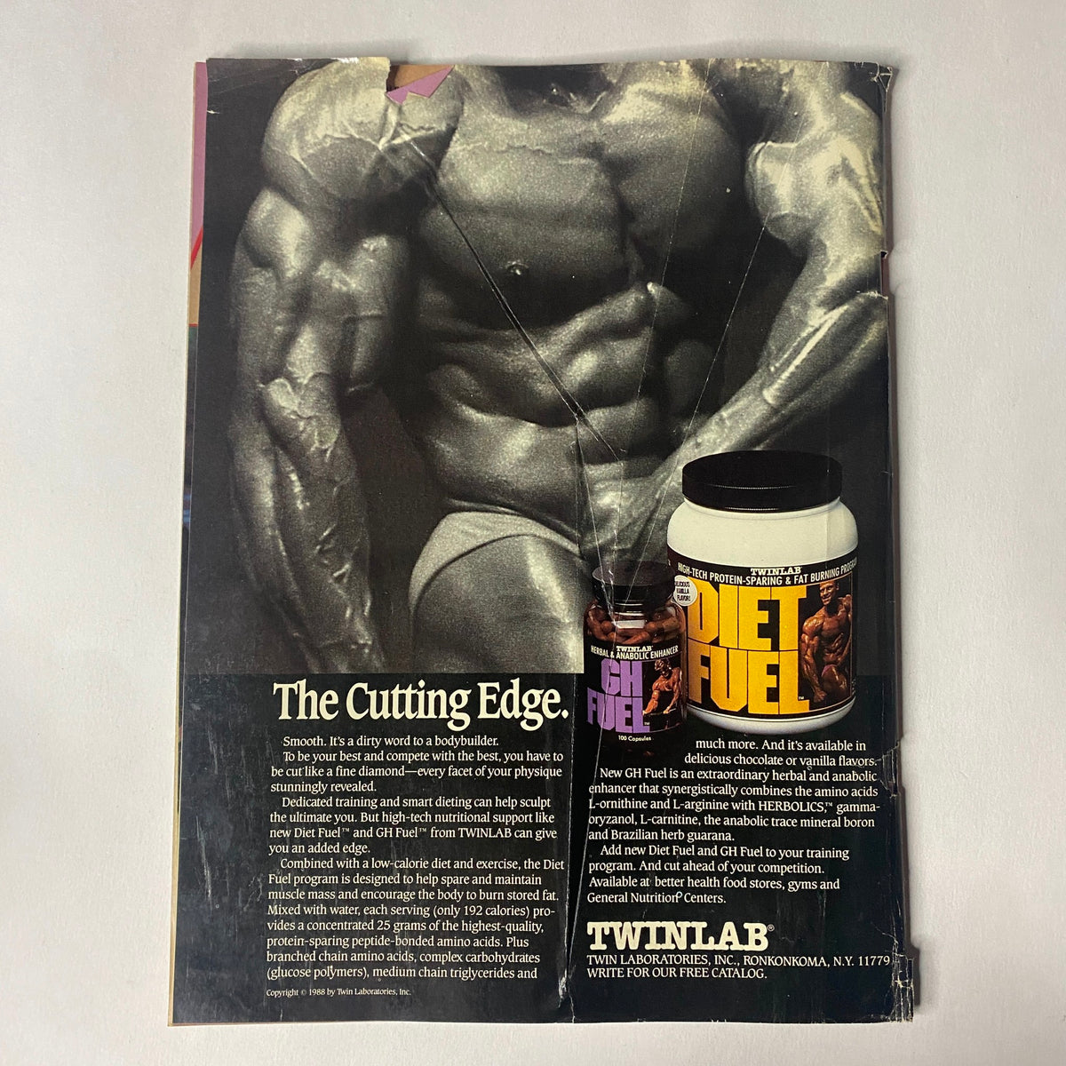 Back cover of Muscle Training Illustrated April 1989 showcasing a bodybuilding advertisement for Twinlab's nutritional products, emphasizing fitness and health supplements.