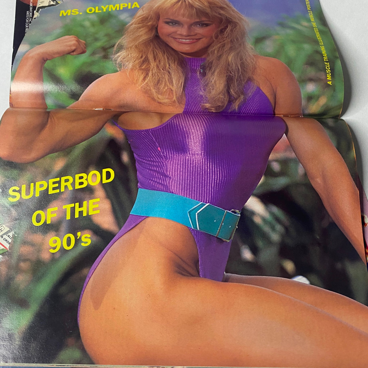 Muscle Training Illustrated January 1990 featuring Ms. Olympia showcasing the 'Superbod of the 90s' in a vibrant purple workout outfit.