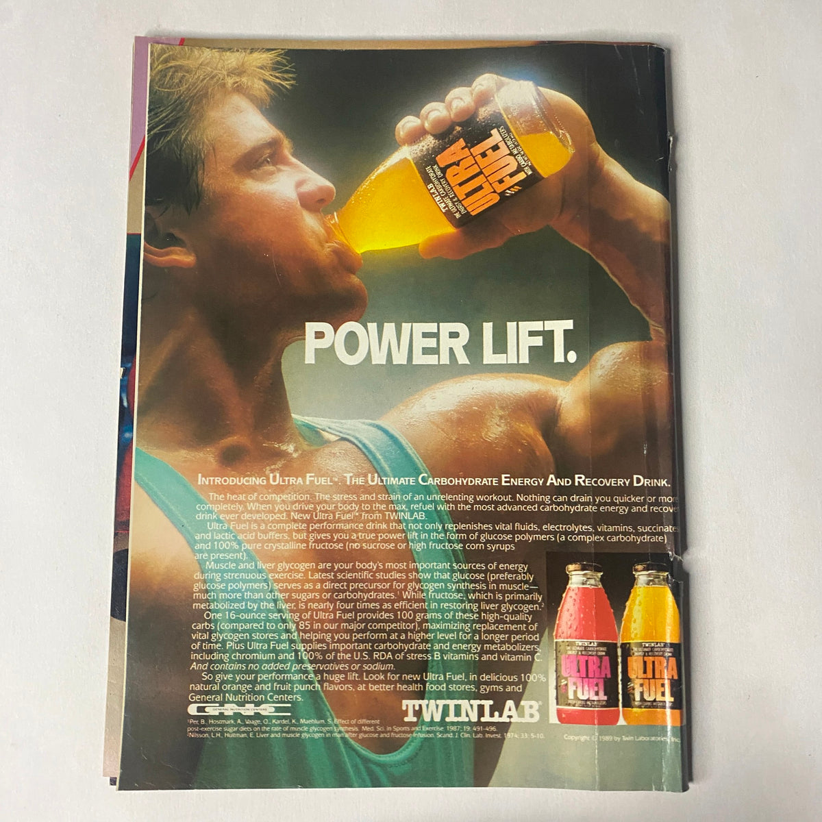Muscle Training Illustrated January 1990 advertisement for Ultra Fuel, highlighting its benefits as an energy and recovery drink with the slogan 'Power Lift'.