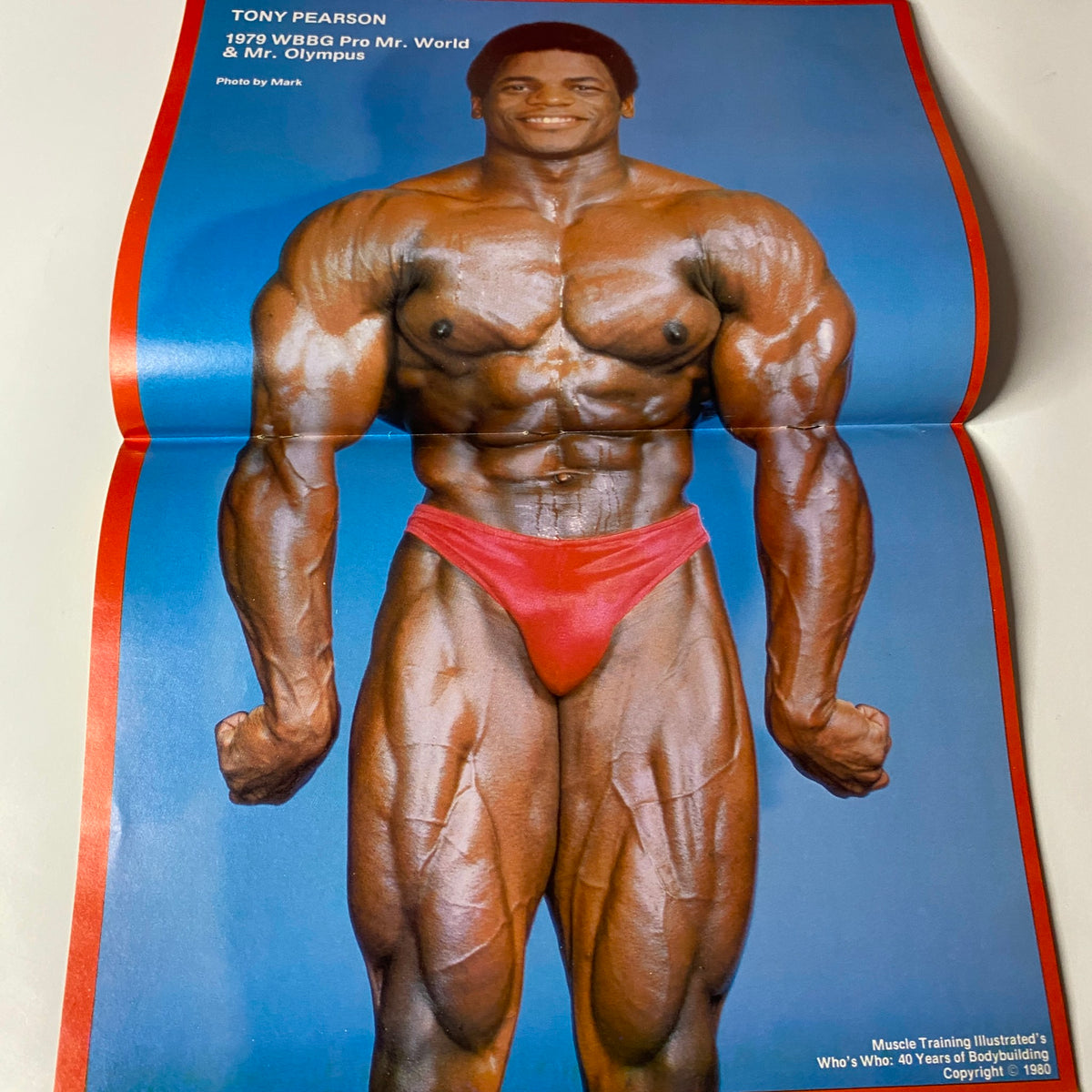 Centerfold image from Muscle Training Illustrated, Summer 1980, showcasing Tony Pearson, WBBG Pro Mr. World & Mr. Olympus.